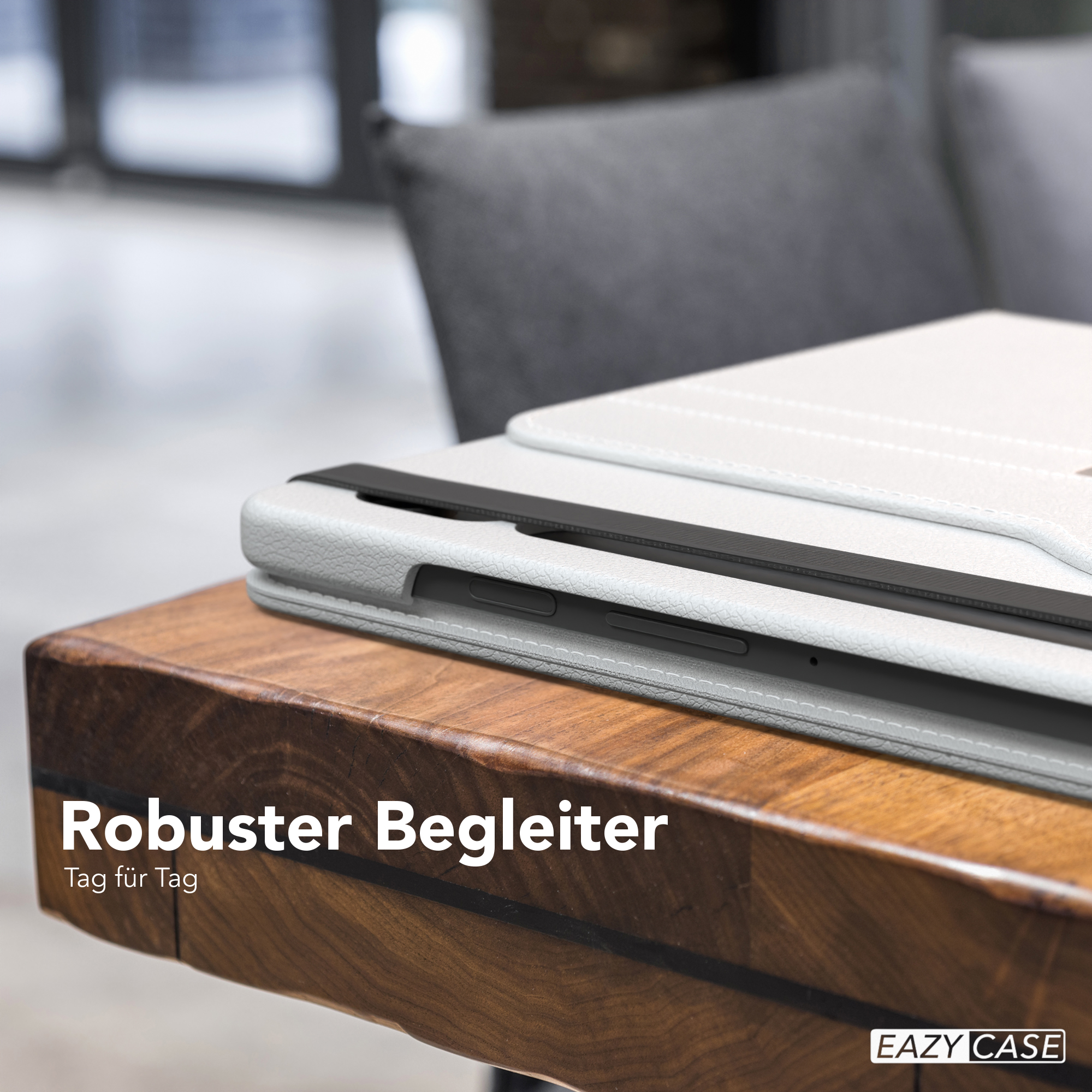 Weißes Tablet-Case auf Holz. Text: 'Robuster Begleiter'. EAZY CASE Logo.