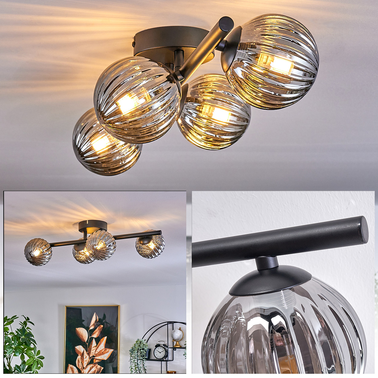 Eine Deckenlampe mit vier kugelförmigen Glasschirmen. Die Lampe ist beleuchtet, die Glühbirnen sind sichtbar.