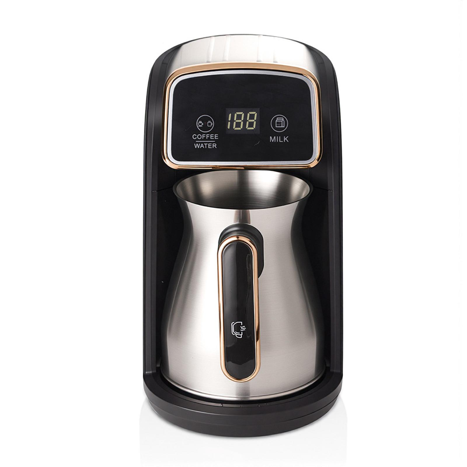 Eine schwarze und silberne Kaffeemaschine mit Digitalanzeige. Der Krug ist aus Edelstahl.