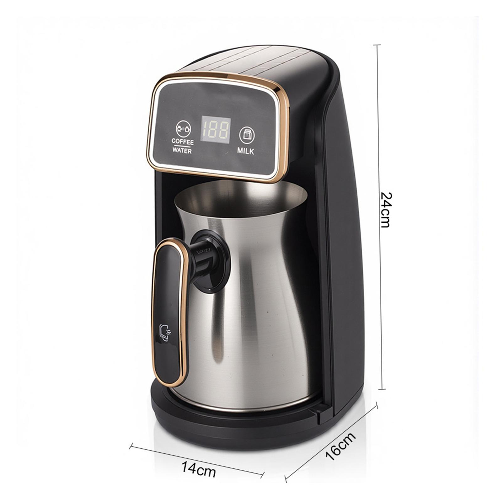 Eine schwarze und silberne Kaffeemaschine mit cm-Maßen.