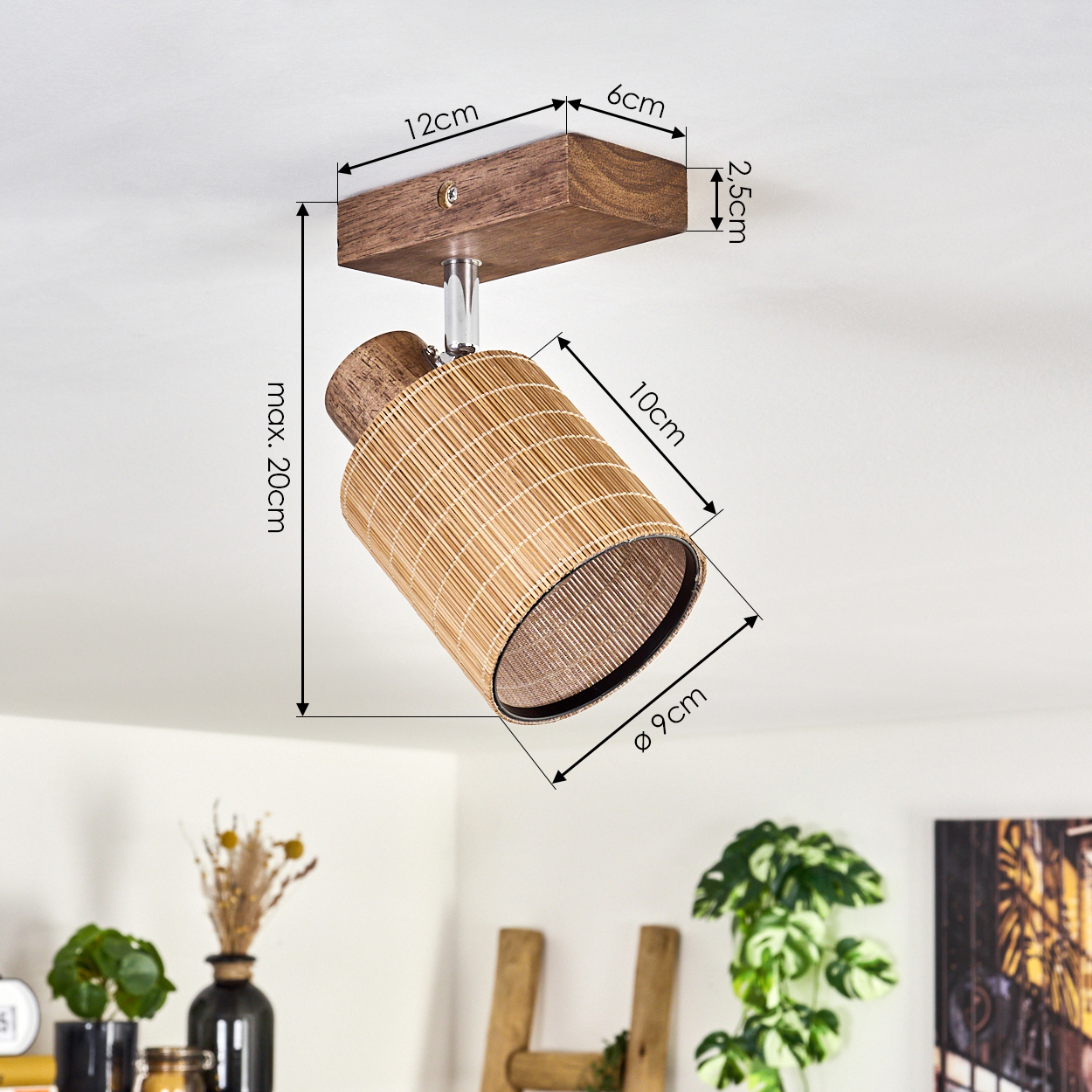Ein Deckenstrahler aus Holz und Bambus. Abmessungen sind mit Pfeilen angegeben.