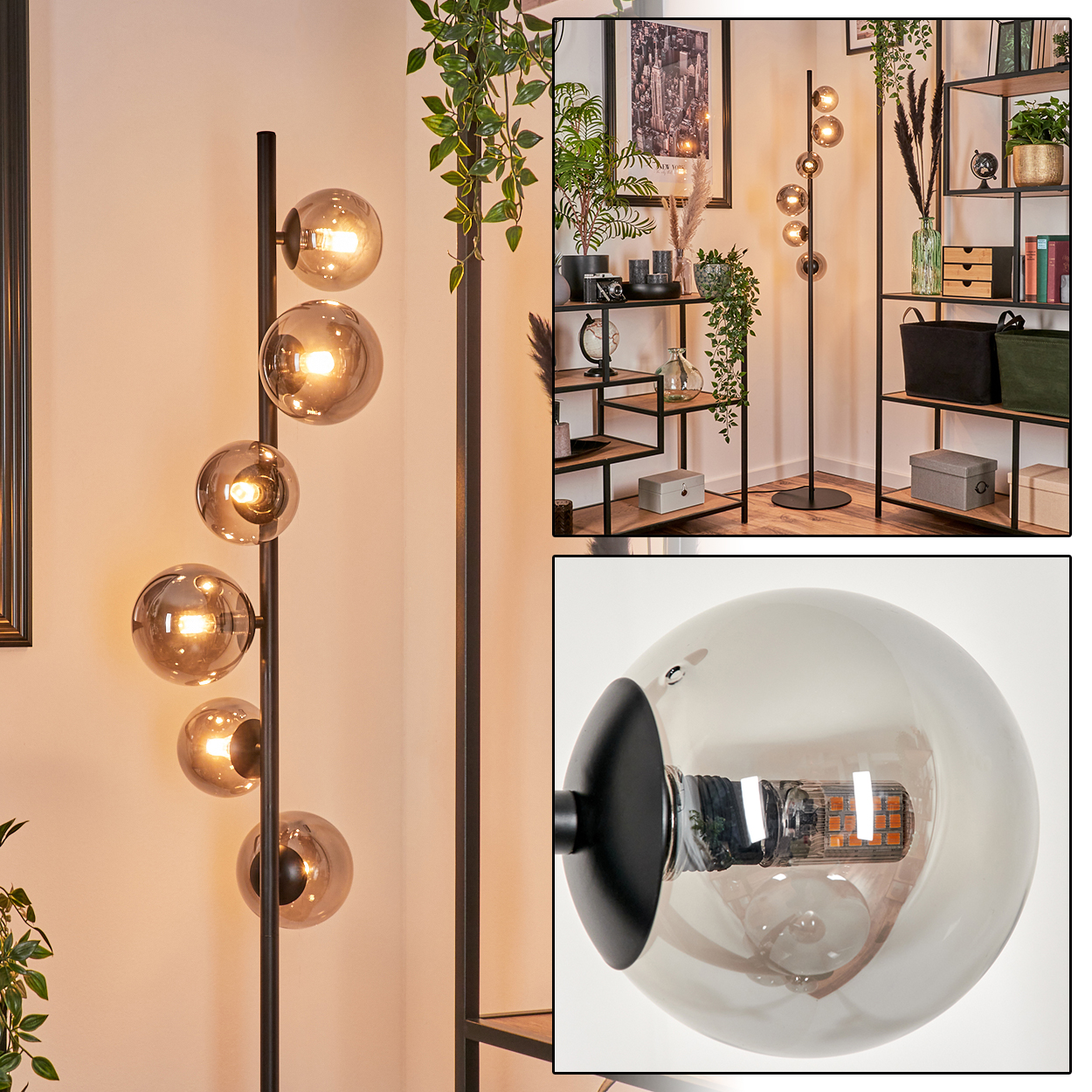 Stehlampe mit silbernen Kugeln, schwarzem Stiel und dekoriertem Zimmer. Bücherregal und andere Deko.