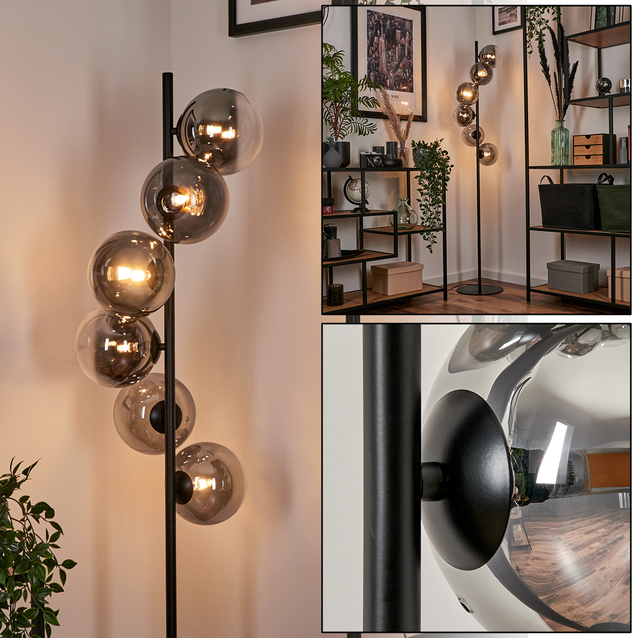 Eine Stehlampe mit mehreren Glaskugelleuchten, schwarzem Stiel und rundem Fuß, in einer Ecke eines Raumes.