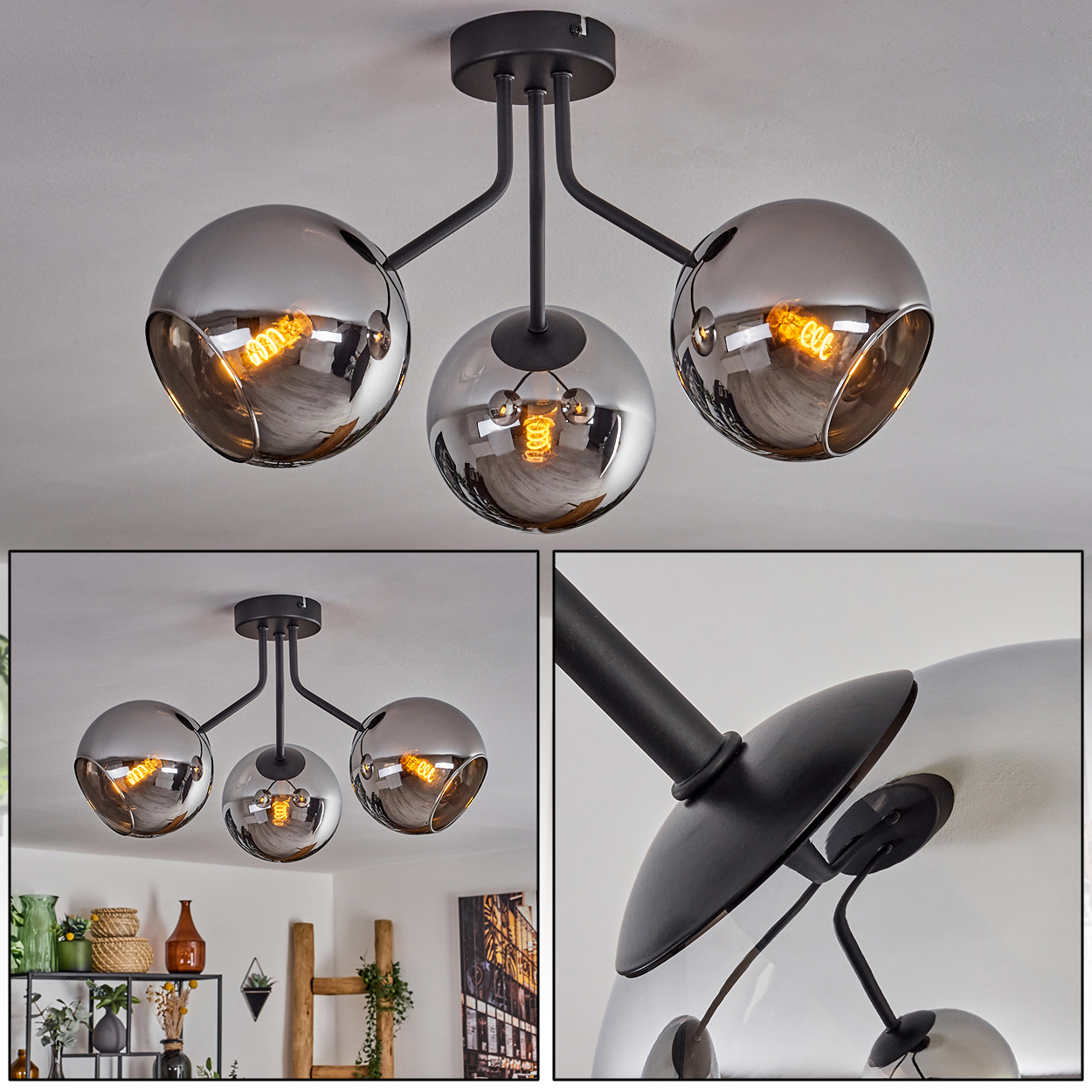 Eine Deckenlampe mit drei grauen Kugeln, jeweils mit einer Glühbirne darin.