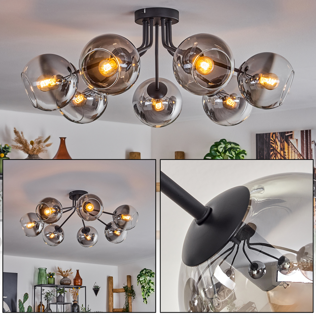 Eine Deckenlampe mit mehreren verchromten Kugeln und Lichtern, kreisförmig angeordnet. Sie hängt von einer weißen Decke ab.