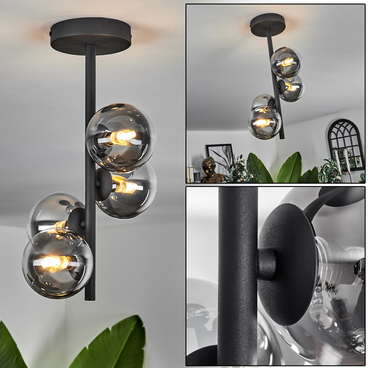 Eine Deckenlampe mit vier grauen Kugeln. Der Hintergrund umfasst Pflanzen, ein Fenster und einen schwarzen Bogen.