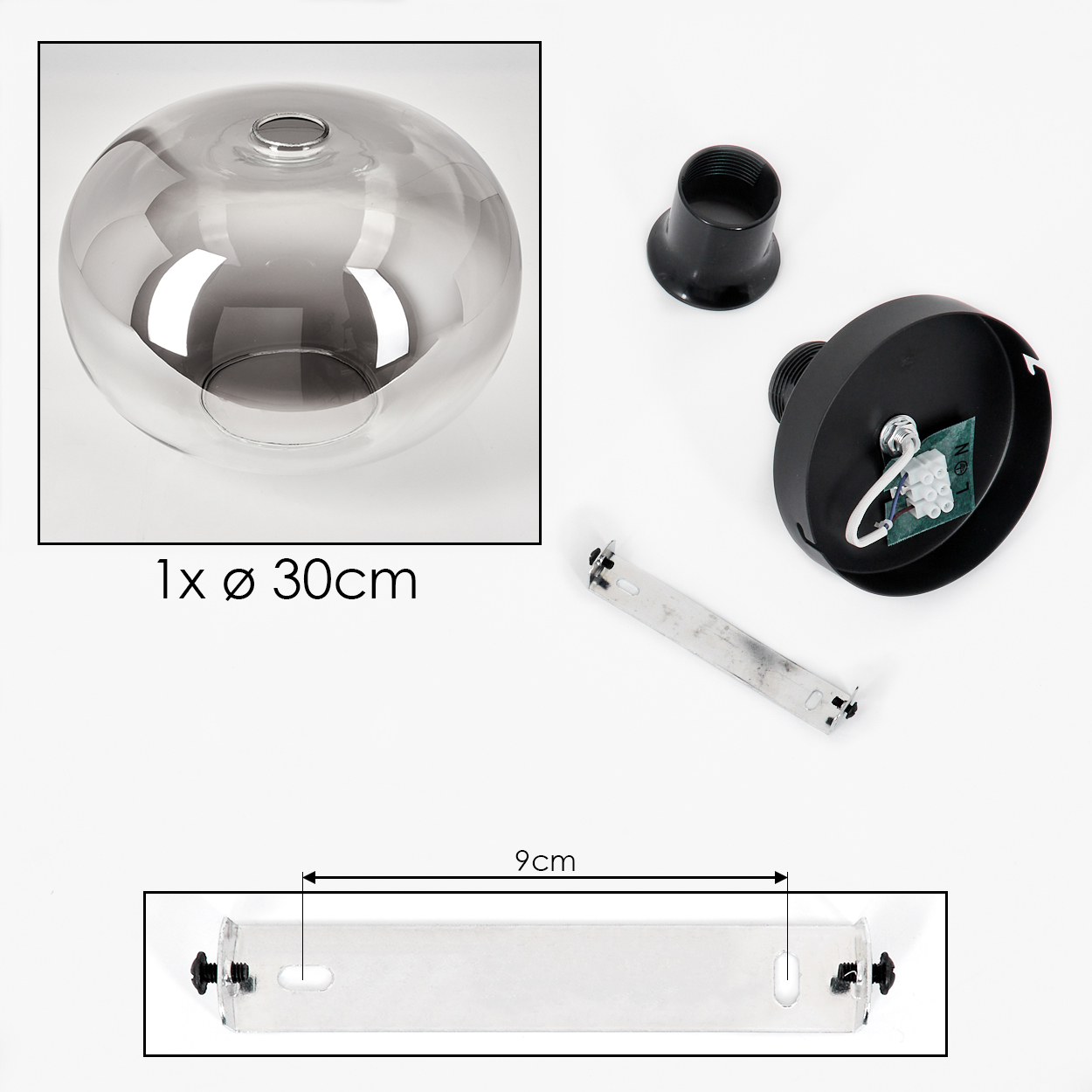 Eine Leuchte mit einer grauen Glühbirne und Komponenten. Enthalten ist ein Maß von 9 cm.