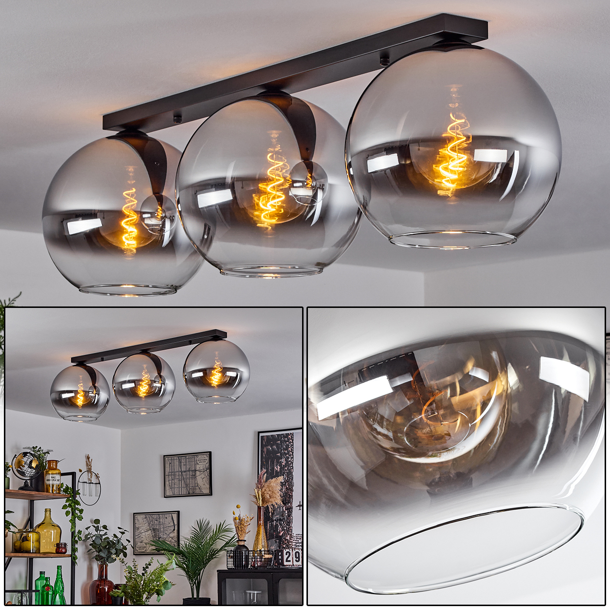 Wohnzimmer mit Deckenleuchte mit 3 verspiegelten Glaskugeln. Die Leuchte ist schwarz.
