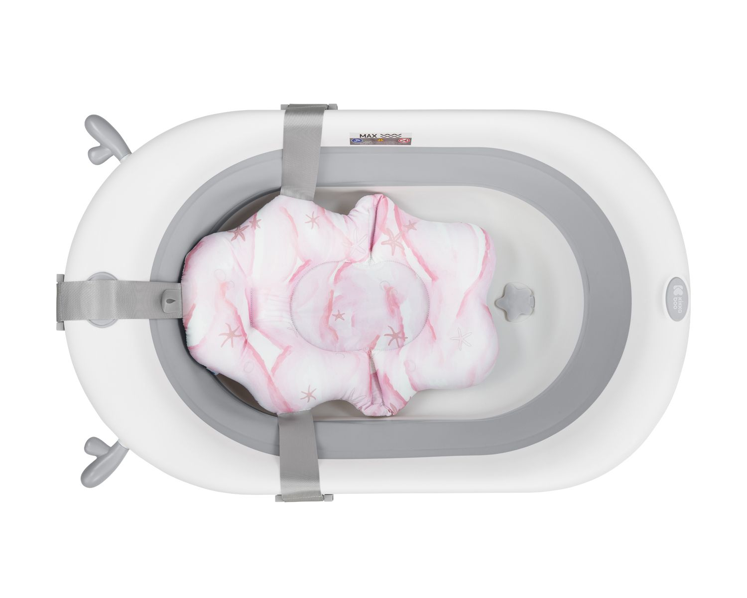 Draufsicht auf eine Babybadewanneneinlage. Rosa gemustertes Kissen mit Sternendesign.