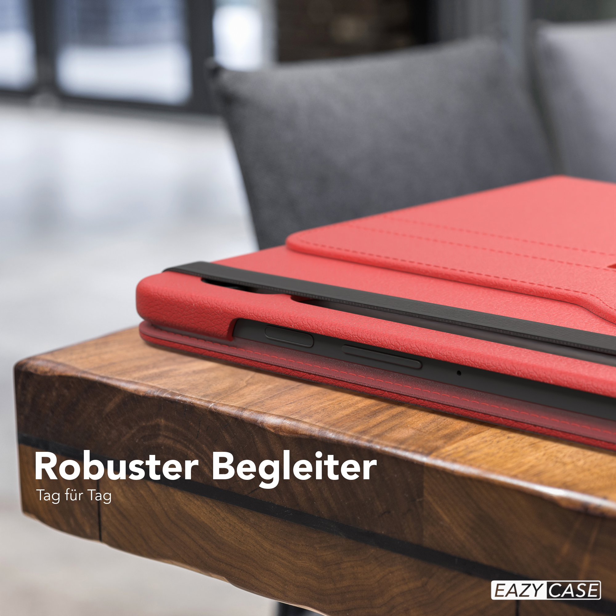 Nahaufnahme eines Tablets in einer roten Hülle auf einem Holztisch. Text sagt 'Robuster Begleiter'. Eazy Case Logo.