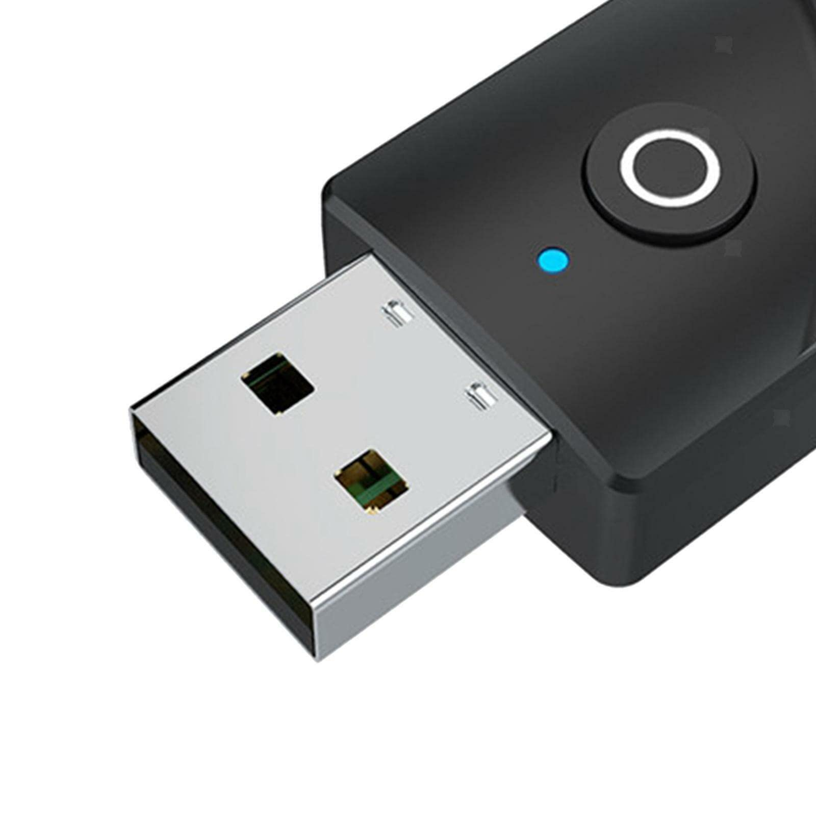 Ein schwarzer USB-Adapter mit USB-Anschluss und blauem Licht. Es hat einen Knopf.