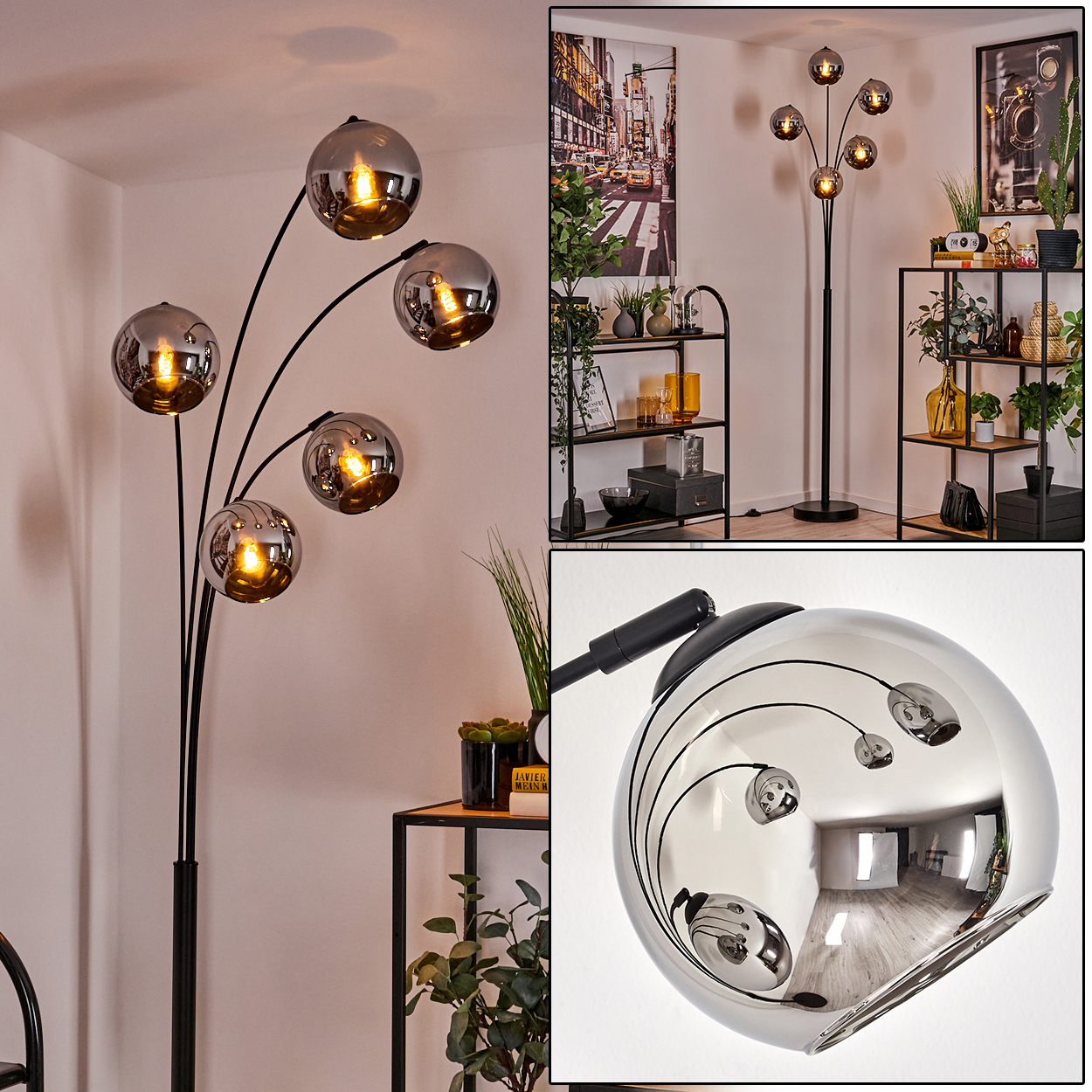 Eine Stehlampe mit mehreren reflektierenden Glaskugeln. Der Raum hat Pflanzen, ein Regal und ein Stadtbild.