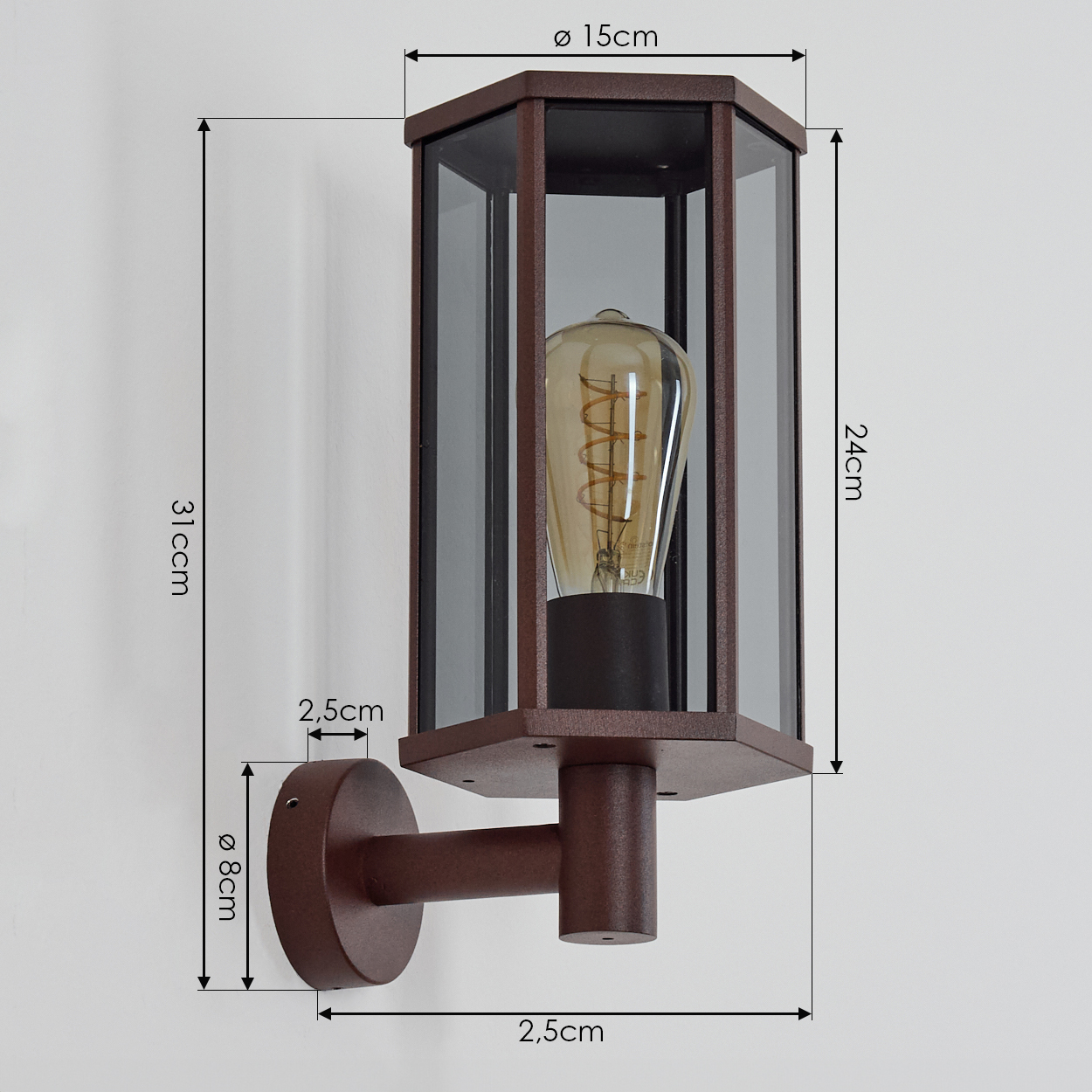 Detaillierte Ansicht einer Wandleuchte mit Abmessungen. Die Lampe hat einen rechteckigen Glasschirm und einen braunen Metallsockel.
