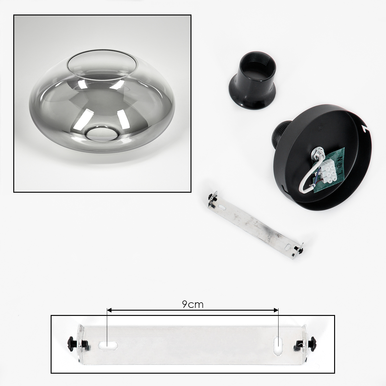 Diagramm einer Pendelleuchte. Enthält Teile: Glaskugel, schwarze Kappe und Montagehalterung.