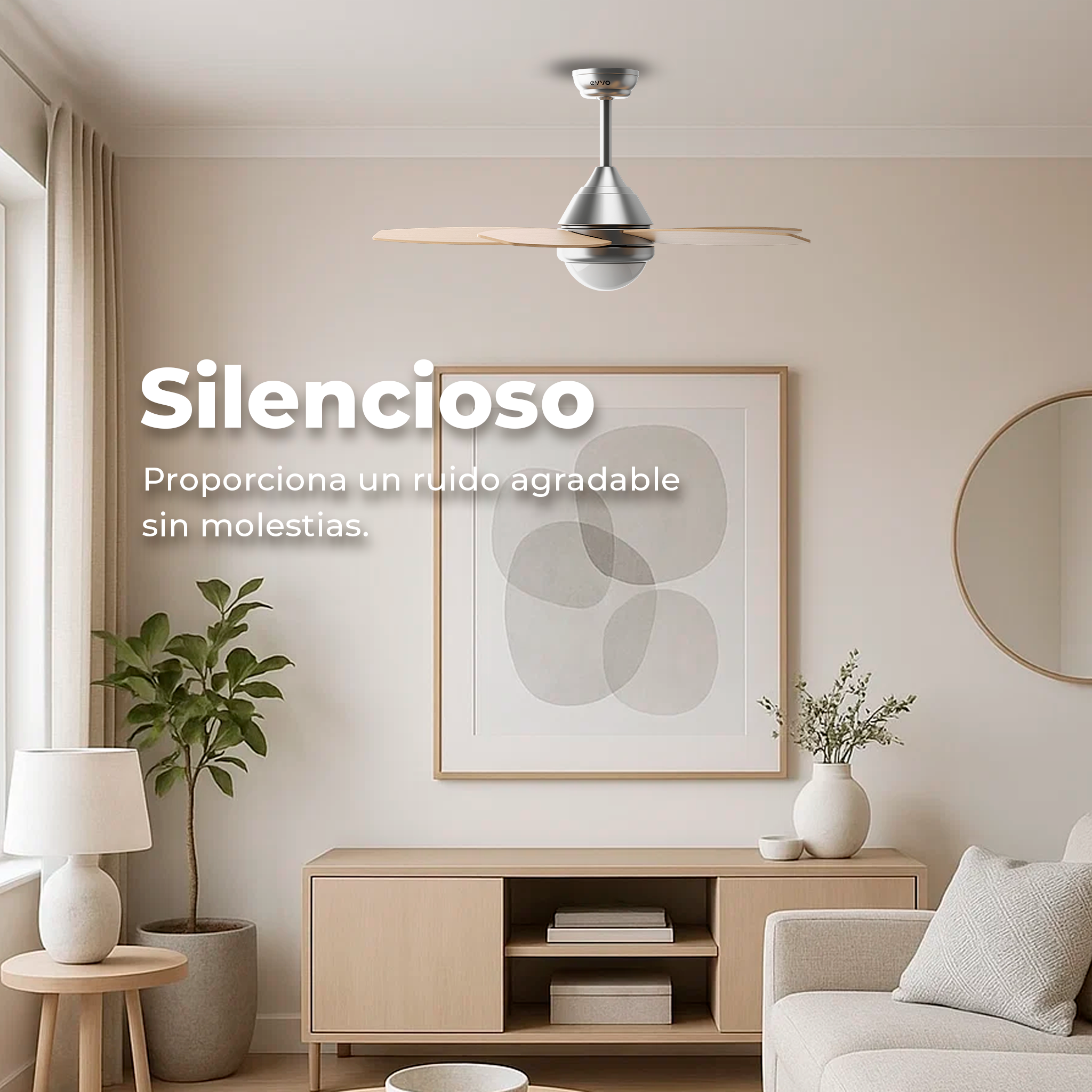 Un salón con ventilador de techo, sofá, armario, pintura y espejo, con texto superpuesto.