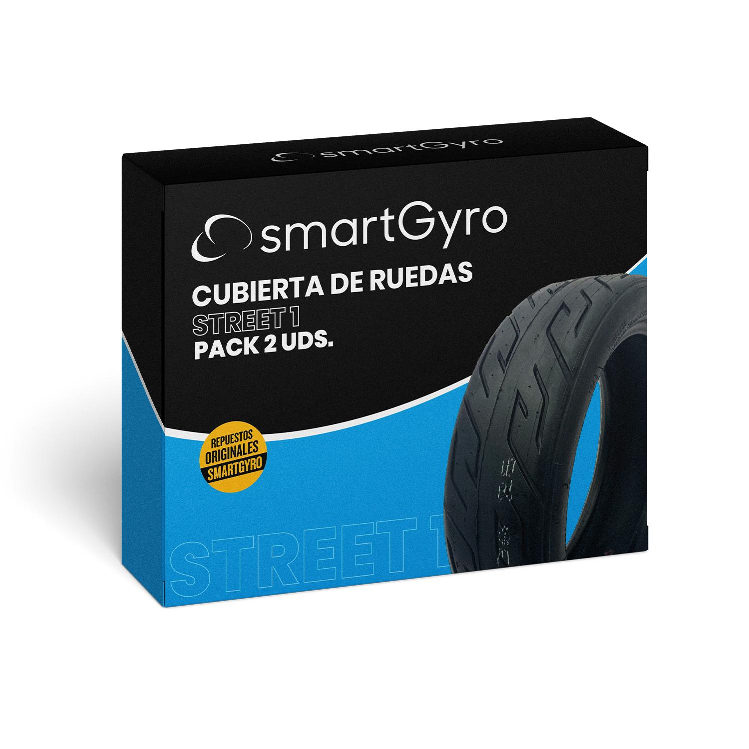 Caja con imagen de neumático. Texto en la caja: SmartGyro, Cubierta de Ruedas, Street 1, Pack 2 uds. Diseño azul y negro.