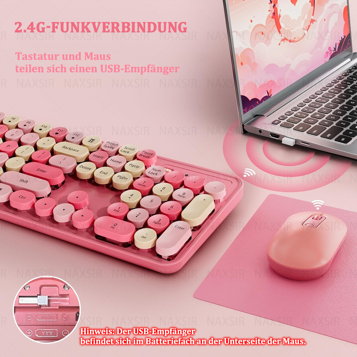 Eine rosa Tastatur- und Maus-Kombination mit einem Laptop und Text auf Deutsch.