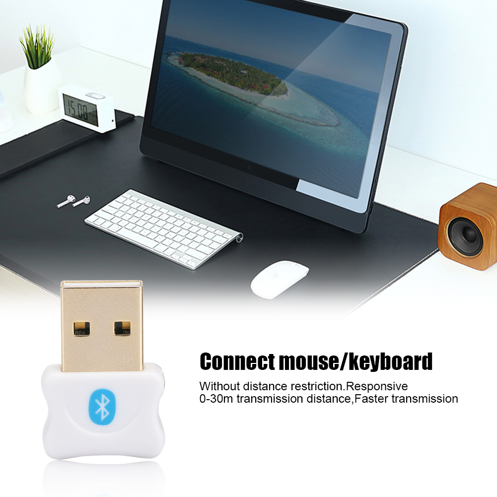 Das Bild zeigt einen Bluetooth-Adapter, der an einen Computer angeschlossen ist, um Tastatur und Maus zu verbinden.