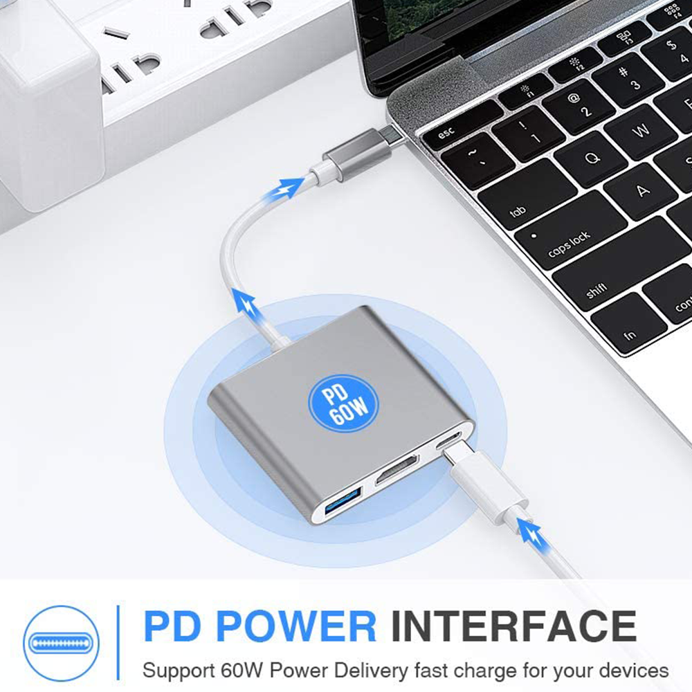 Silberner USB-C-Adapter am Laptop. Mehrere Anschlüsse, einer mit PD 60W. Text zeigt PD-Stromversorgungsschnittstelle.