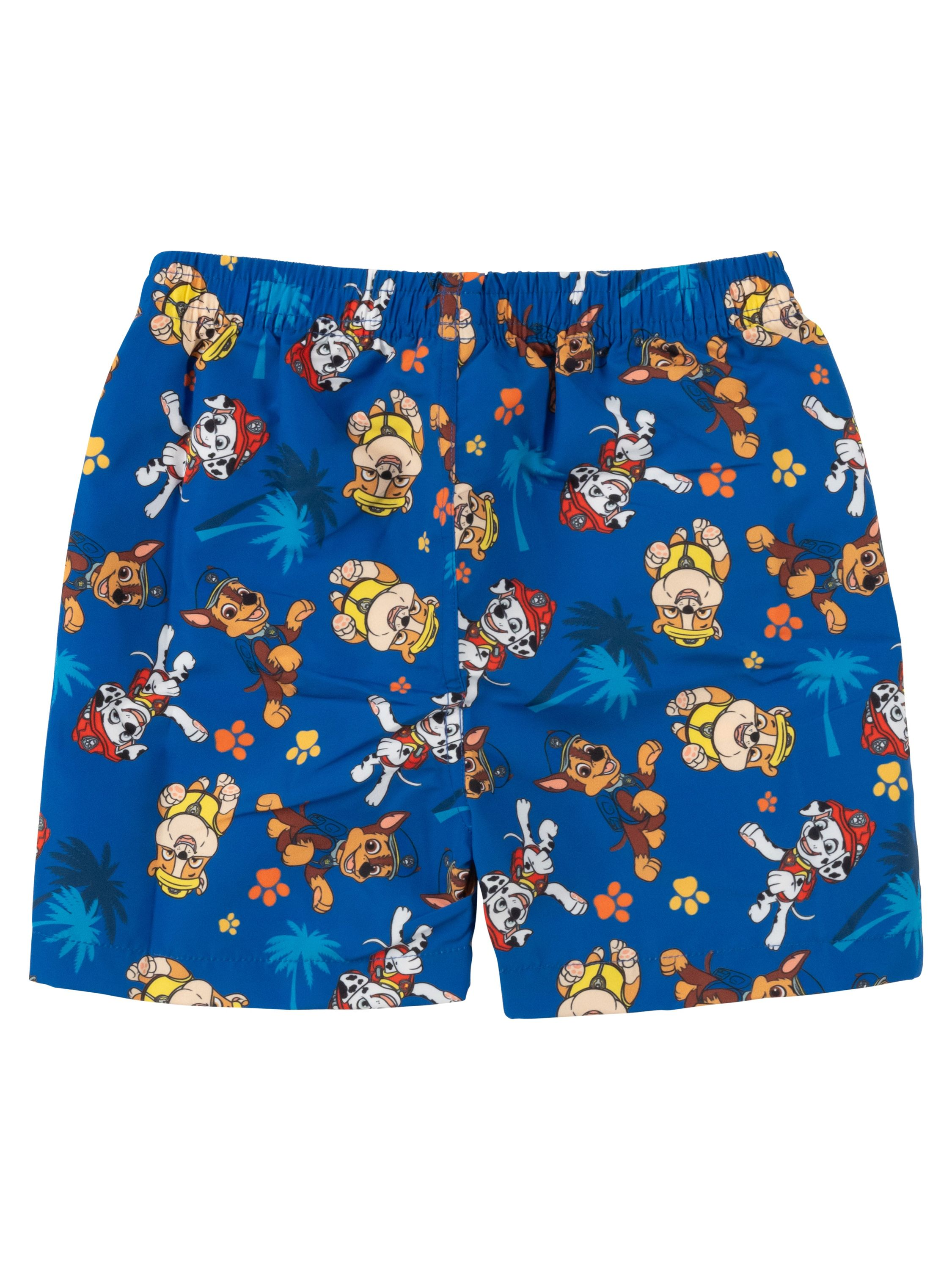 Blaue Paw Patrol Badeshorts mit Cartoonfiguren auf weißem Hintergrund.