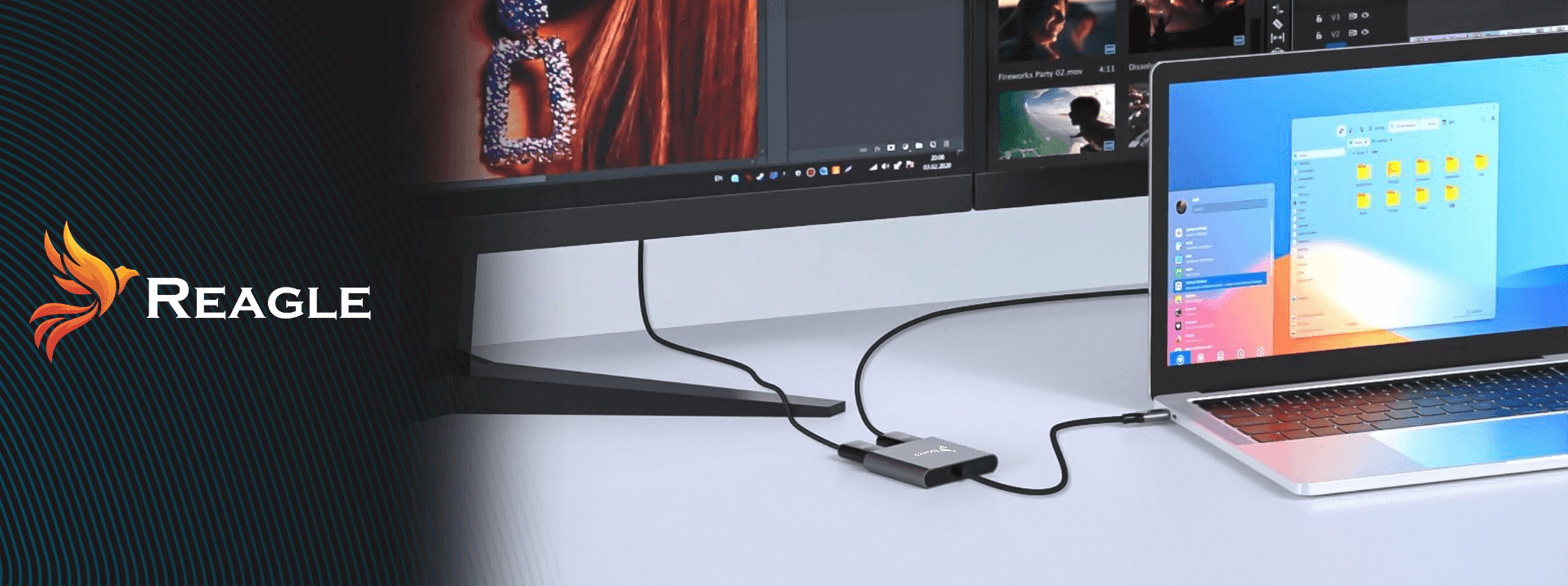 Laptop podłączony do monitora, z adapterem Reagle pomiędzy. Scena na ekranie.