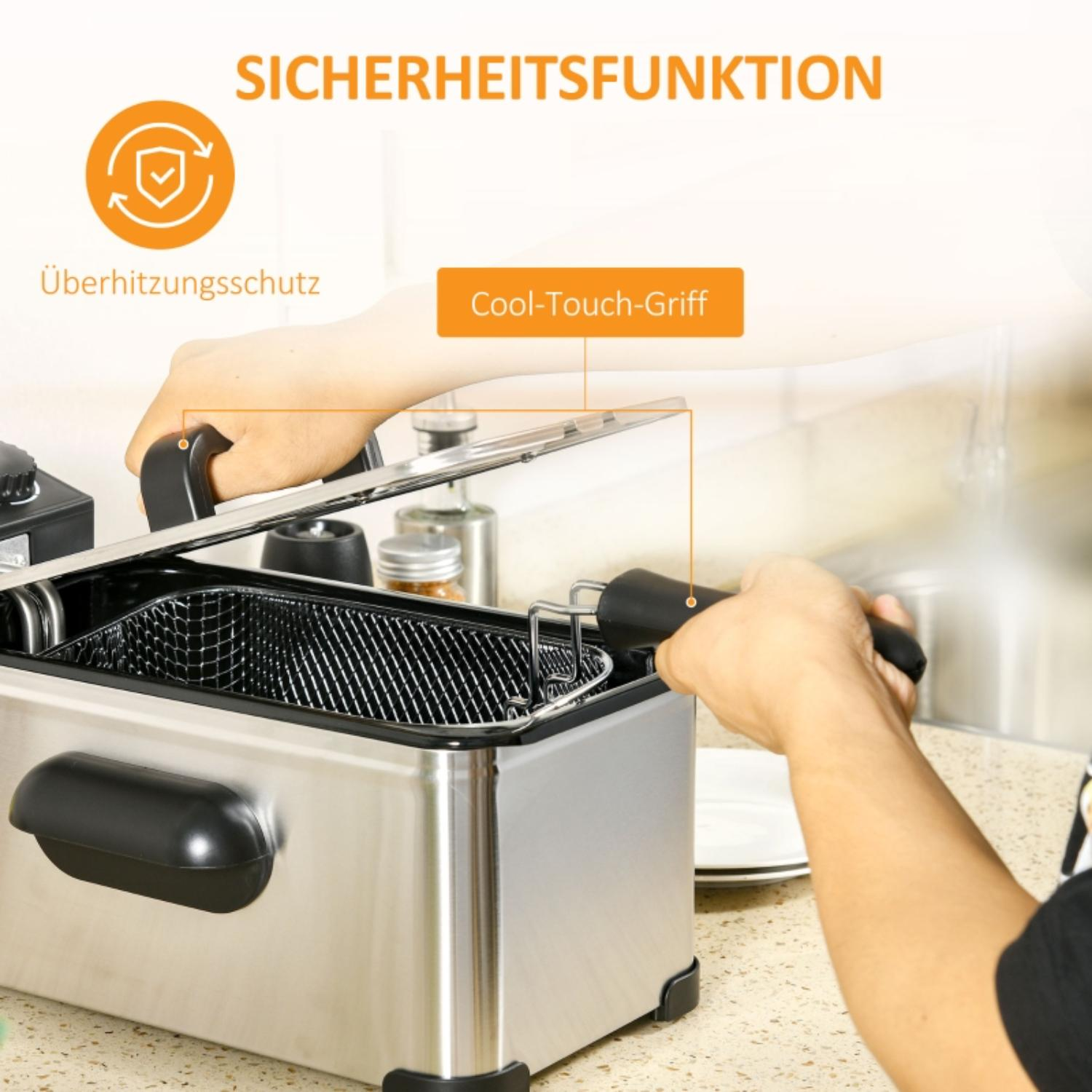 Hände öffnen den Deckel einer silbernen Fritteuse.