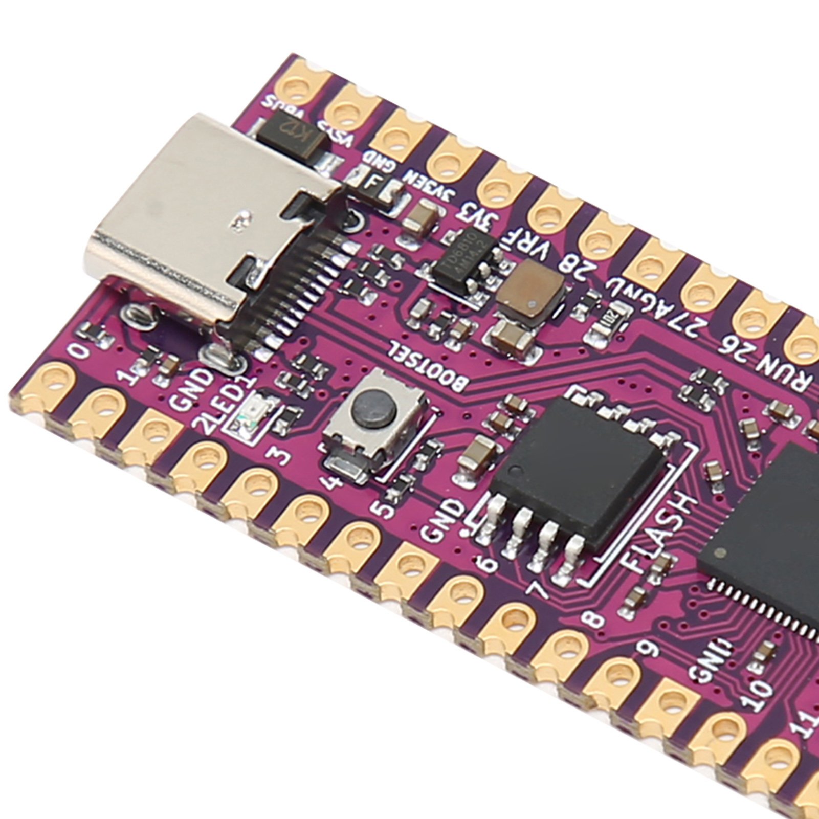 Eine violette Leiterplatte mit verschiedenen elektronischen Bauteilen und einem USB-C-Anschluss.