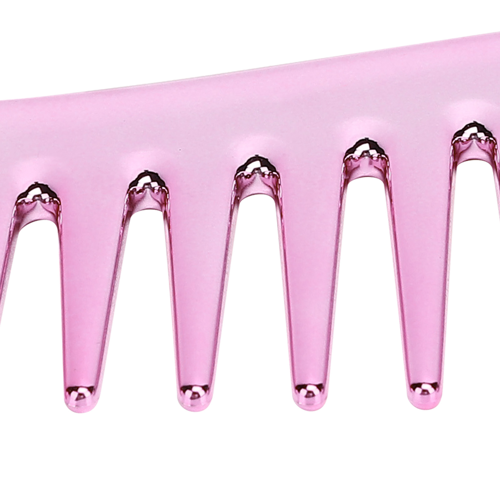 Nahaufnahme eines rosa Kamms. Die Zähne sind breit und abgerundet.