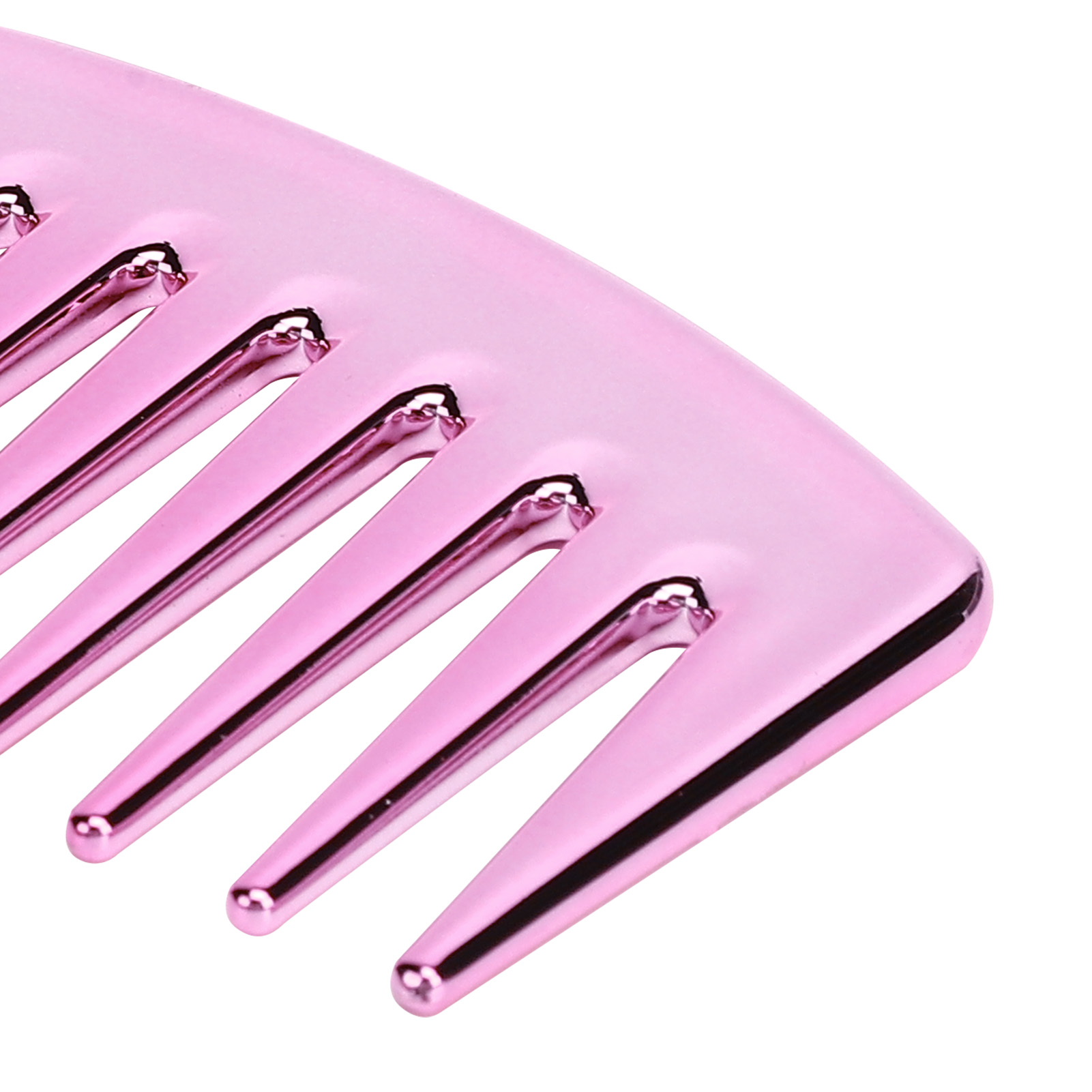 Nahaufnahme eines rosa Kamms. Die Zähne sind breit und abgerundet.