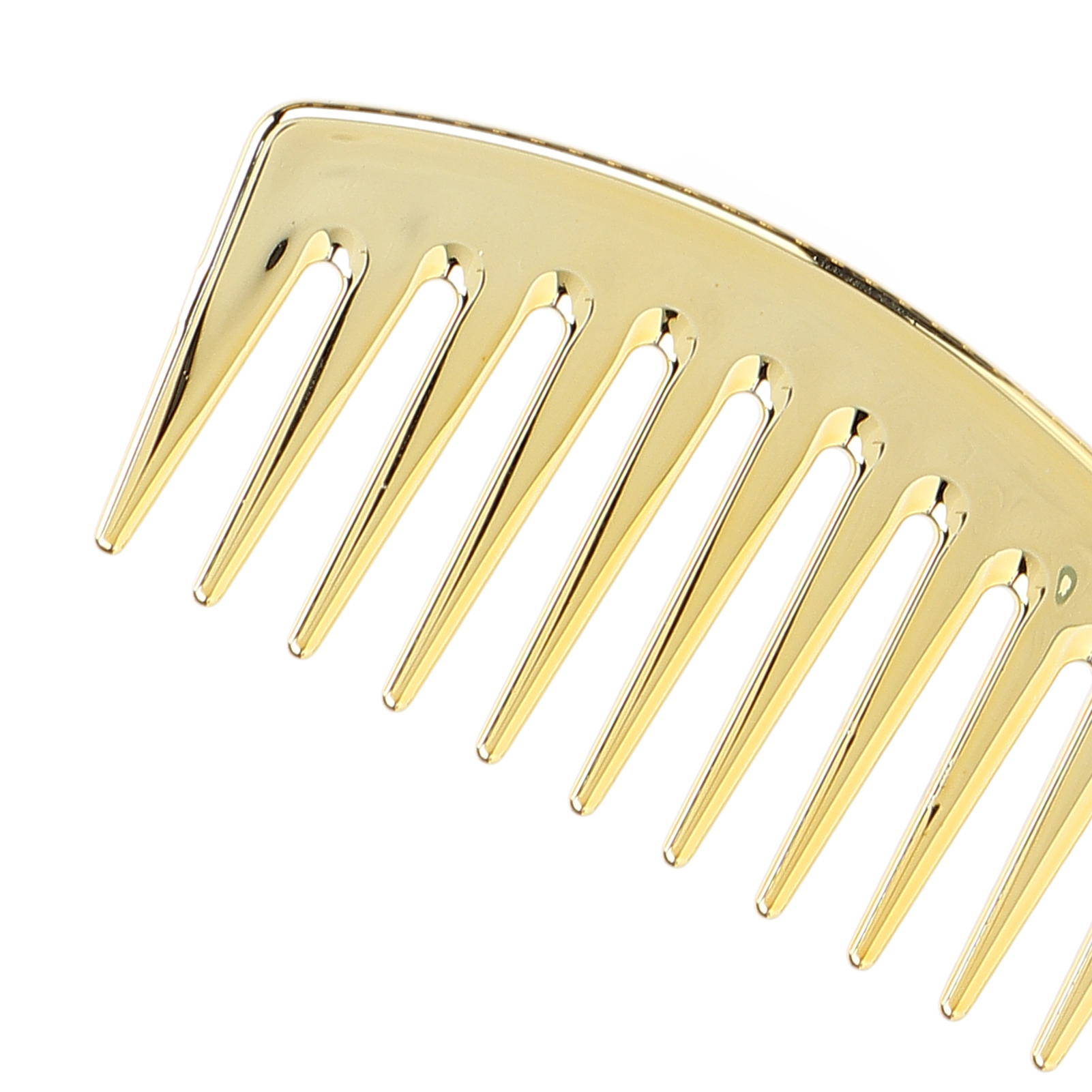Nahaufnahme eines goldenen Kamms. Der Kamm hat breite Zähne.