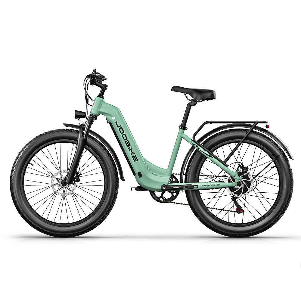 Zielony rower elektryczny. Ma duże opony i jest na czarnym tle. Rower to JOOBİKE.