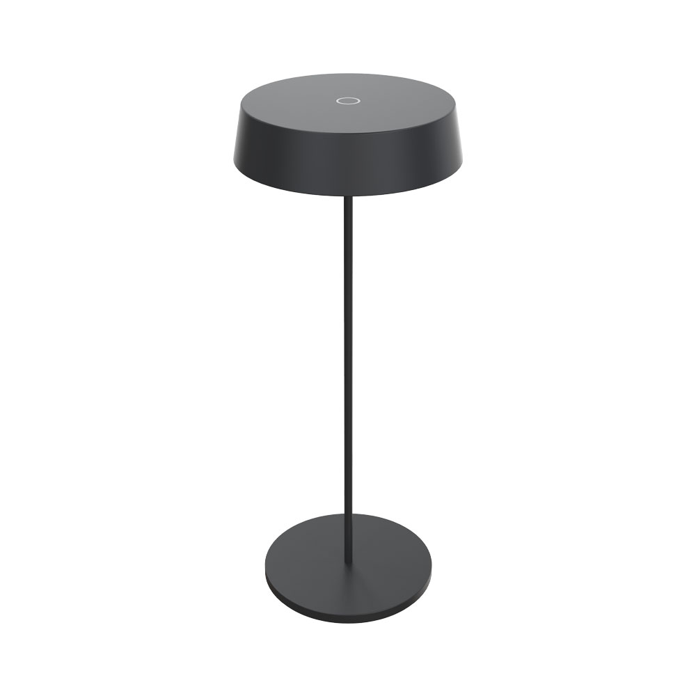 Una moderna lampada da tavolo nera opaca con base circolare e paralume cilindrico.