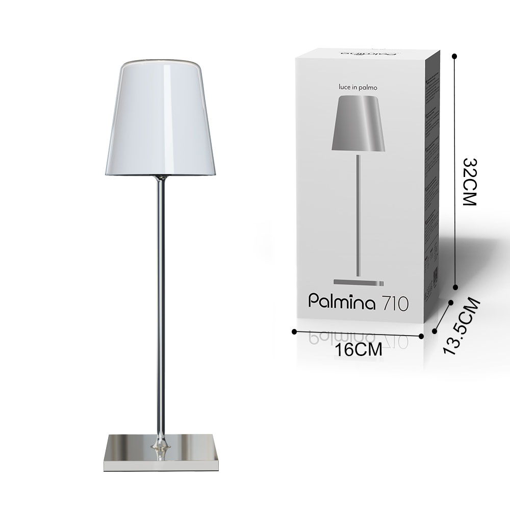 Una lampada argentata con paralume bianco e scatola accanto con dimensioni.