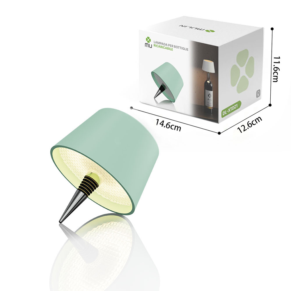 Una lampada verde con base a cavatappi e la sua confezione, con dimensioni.