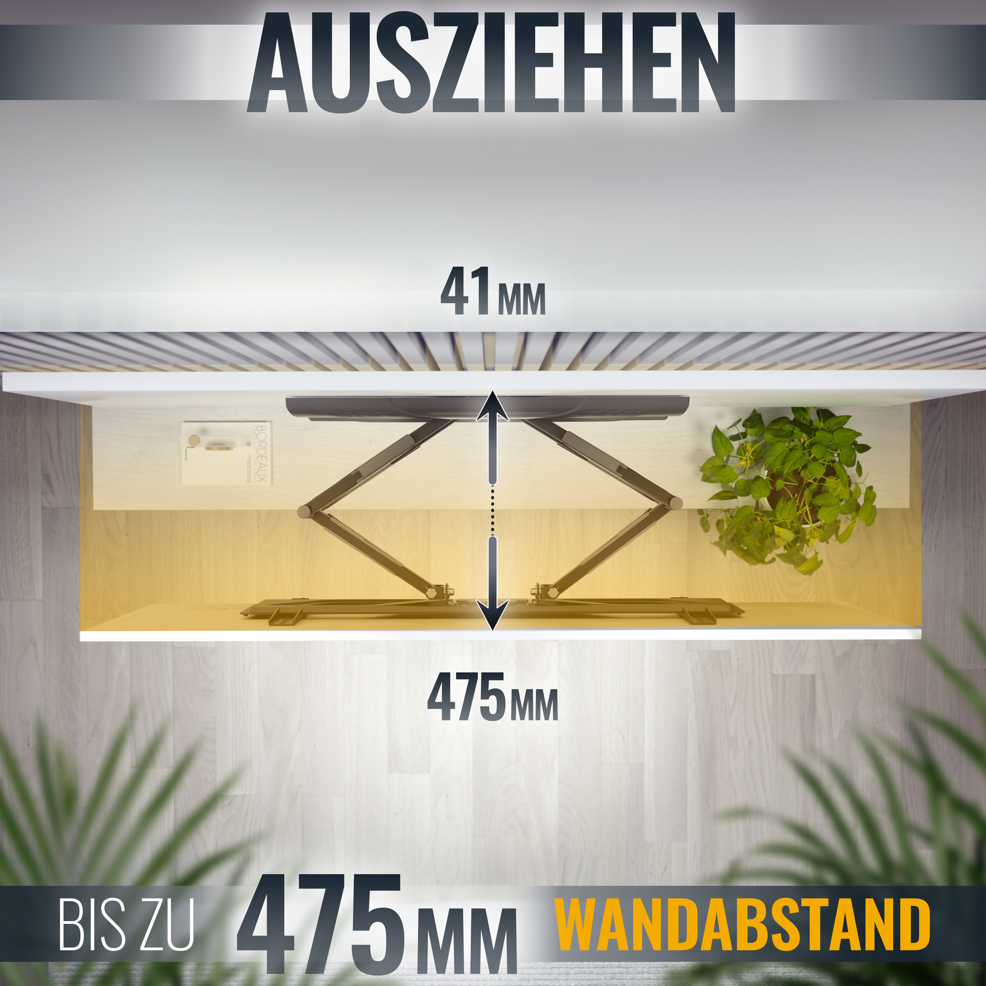 Ein Schreibtisch mit TV-Halterung und Text: AUSZIEHEN, 41MM, 475MM und WANDABSTAND.
