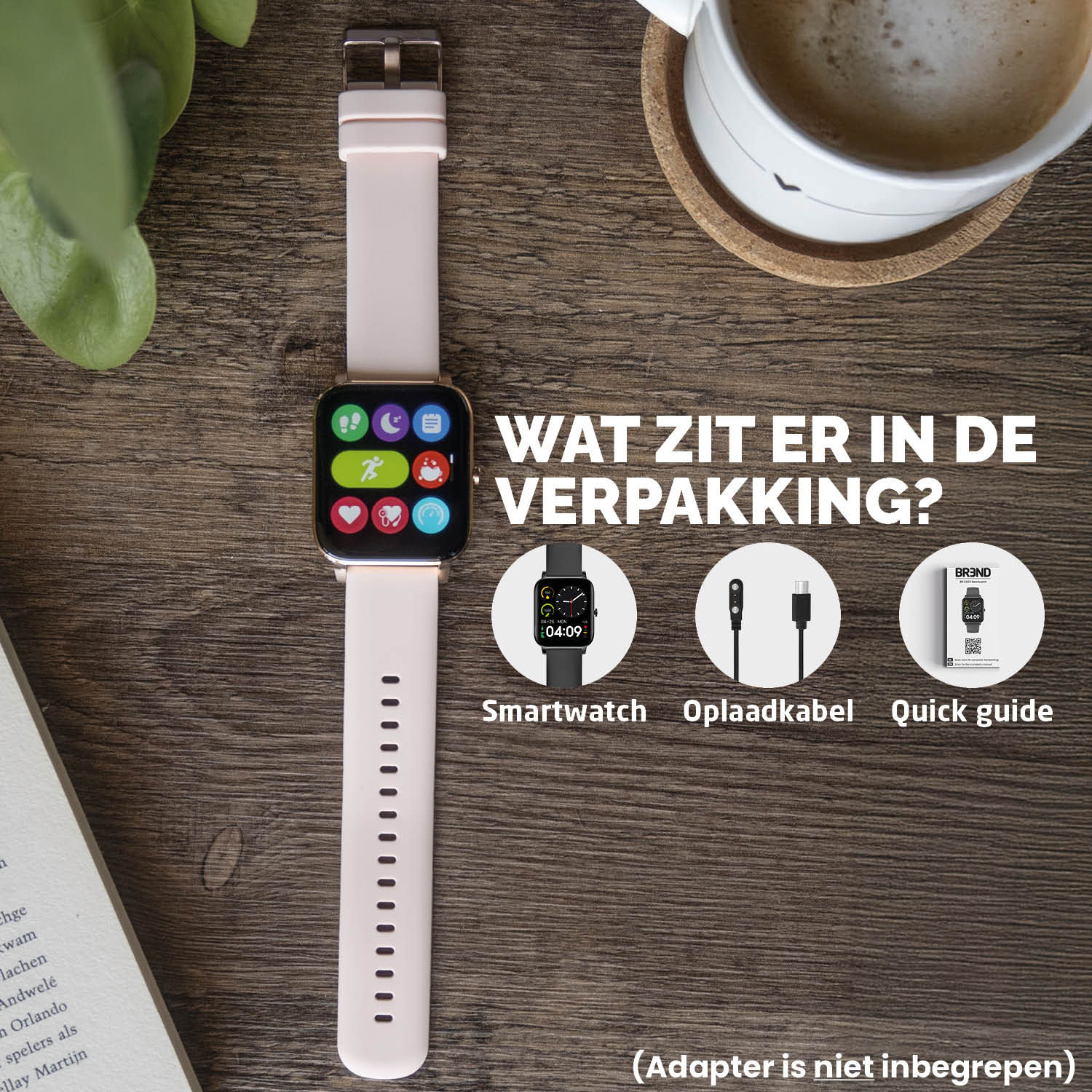 Een smartwatch met een roze band. Een kopje koffie ernaast en de tekst op de doos.