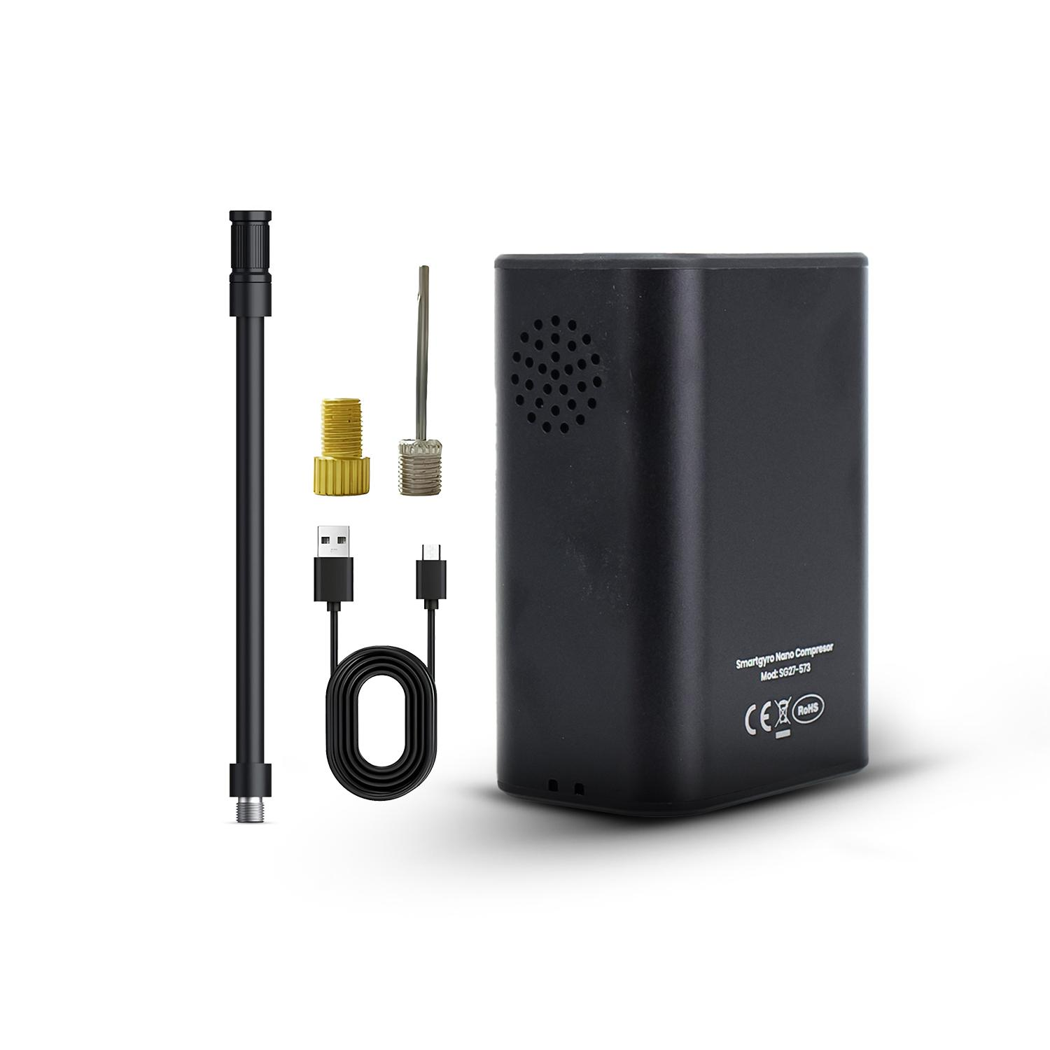 Inflador de neumáticos negro con accesorios sobre fondo blanco. Incluye manguera, boquilla y cable USB.