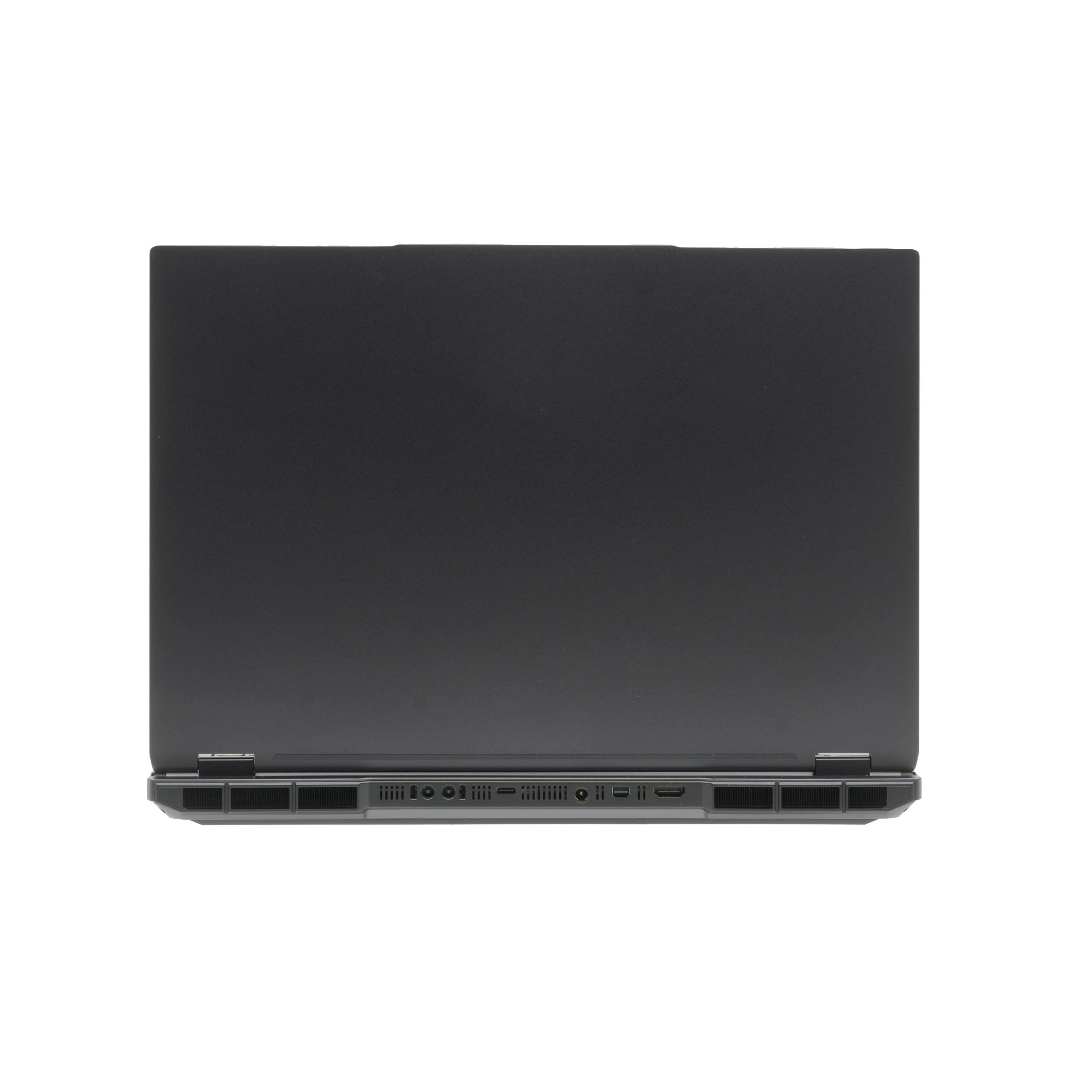 Die Rückseite eines Laptops wird angezeigt. Sie hat eine dunkelgraue Oberfläche, und verschiedene Anschlüsse sind unten sichtbar.