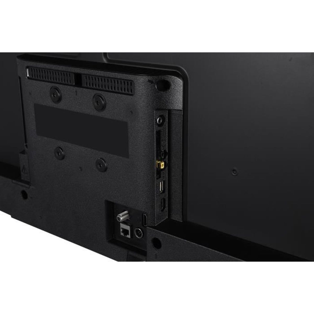 Czarny tylny panel telewizora z portami. Widok z boku: USB, HDMI i inne połączenia.
