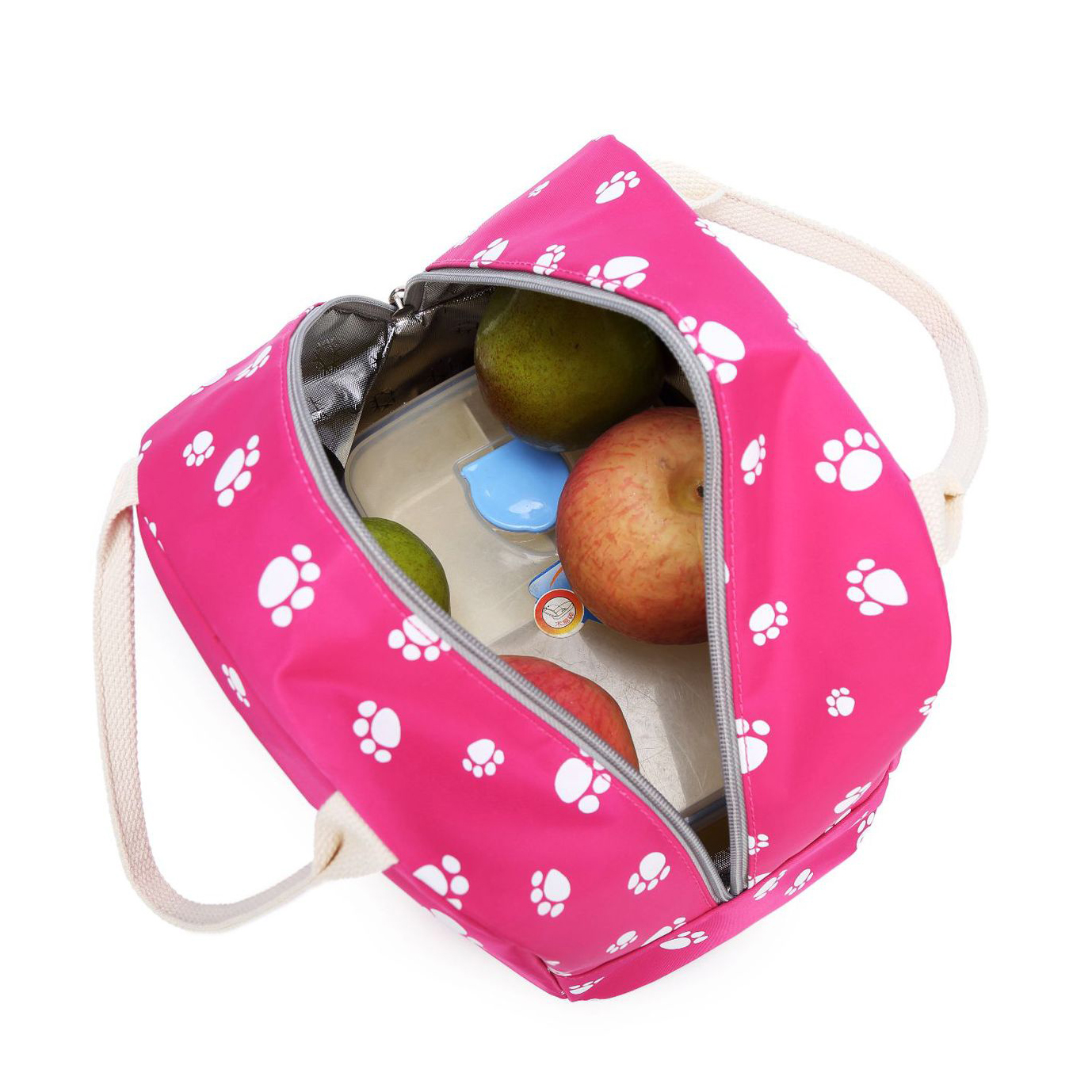 Rosa Lunch-Bag mit weißen Pfotenabdrücken, offen, mit Äpfeln, einer Birne und einem Behälter darin.