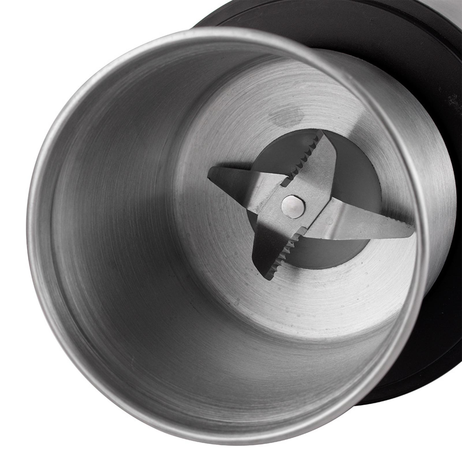 Nahaufnahme der Klinge einer Kaffeemühle. Die Klinge ist aus Metall und hat vier Spitzen.