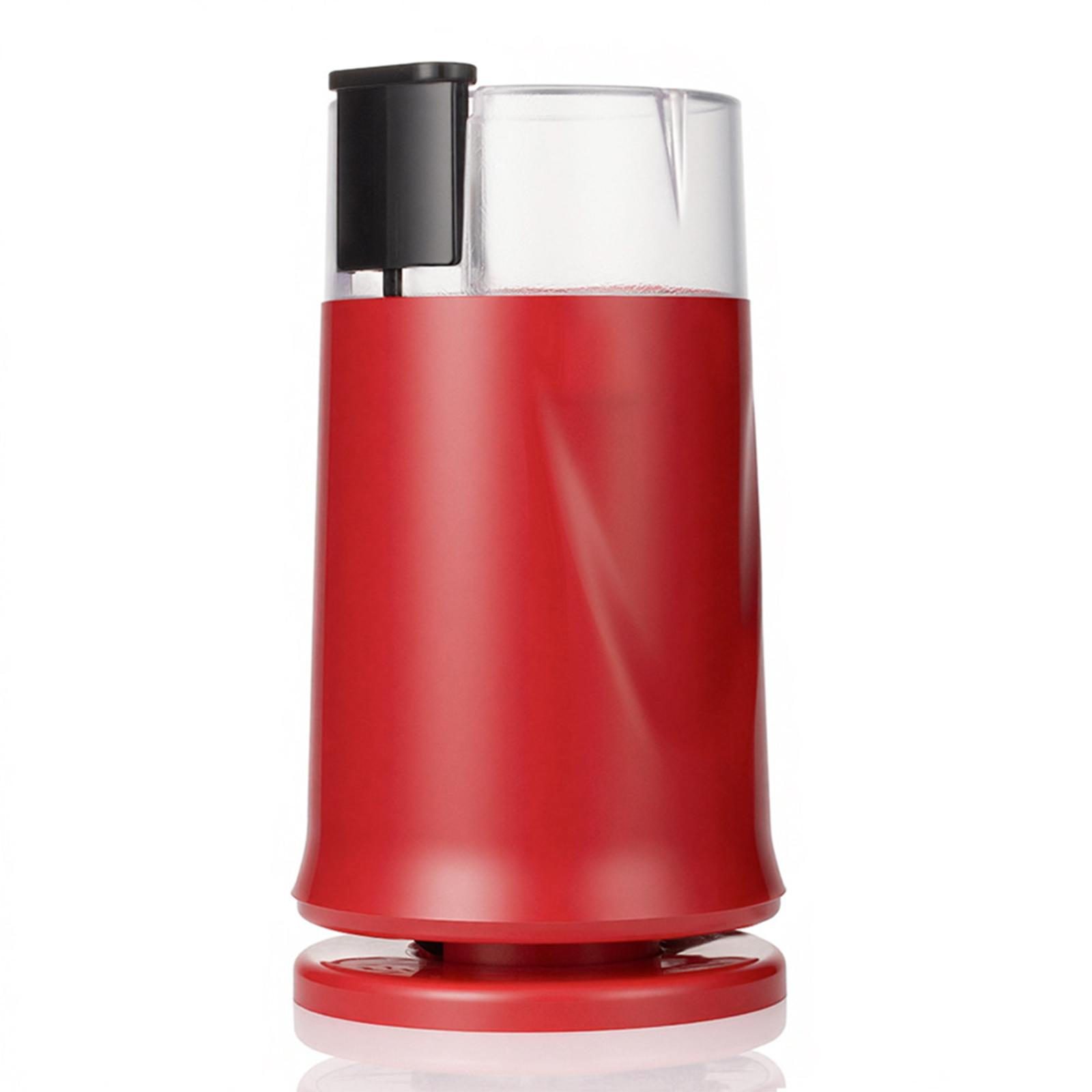 Roter Kaffeemühle mit schwarzem Deckel und transparentem Behälter, isoliert auf weißem Grund.