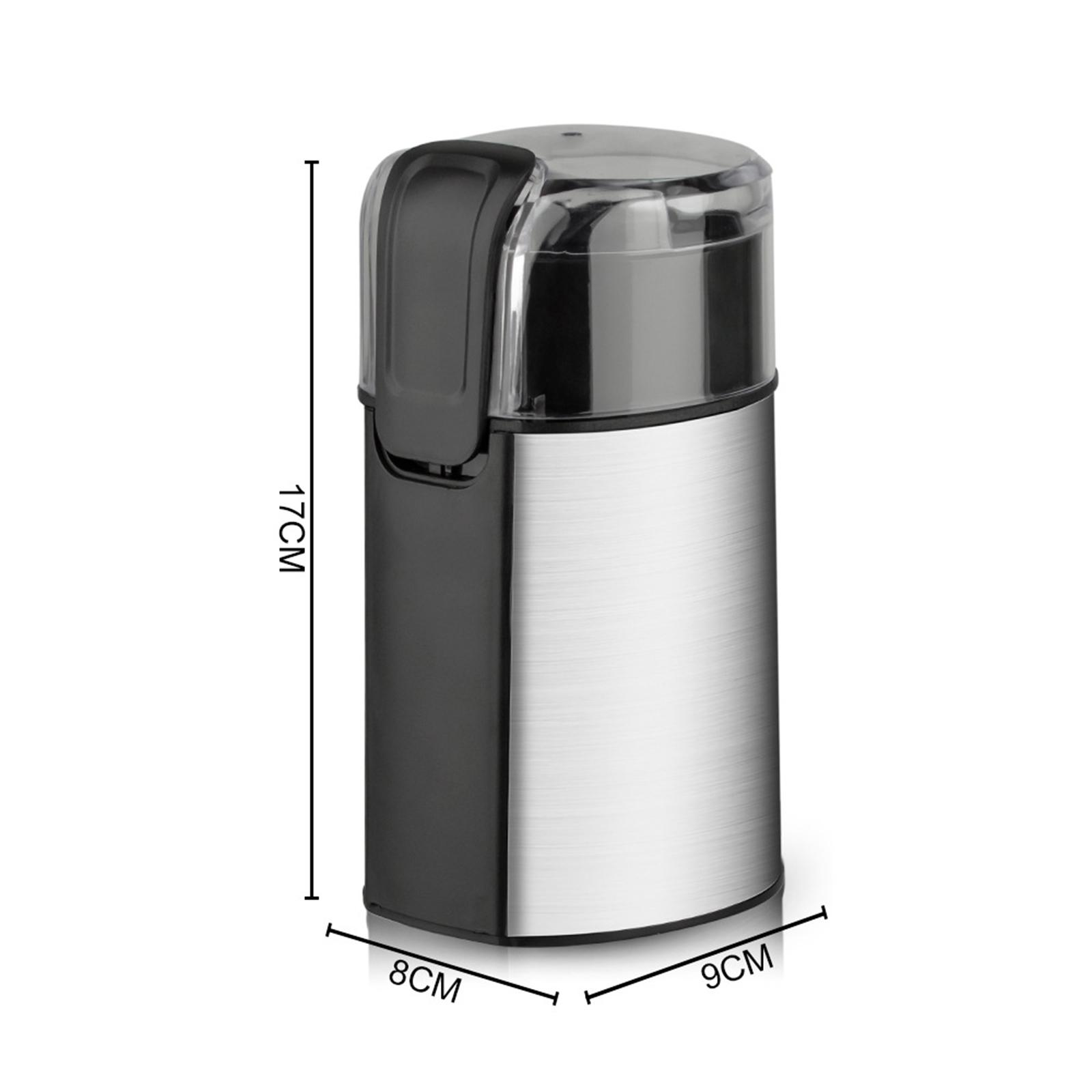 Silber-schwarze Kaffeemühle. Maße: 17 cm hoch, 8 cm breit und 9 cm tief. Klarer Deckel.