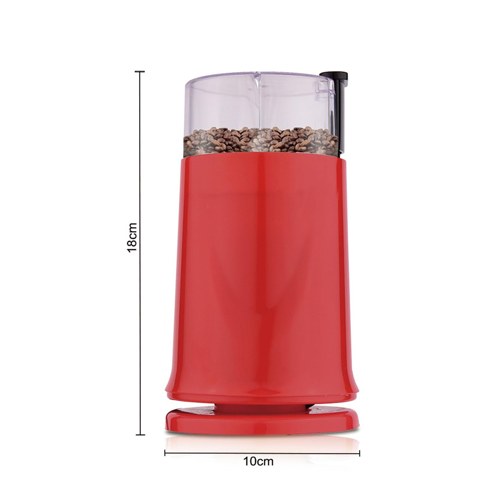Rote Kaffeemühle mit transparentem Deckel. Maße: 18 cm hoch und 10 cm breit. Kaffeebohnen innen.