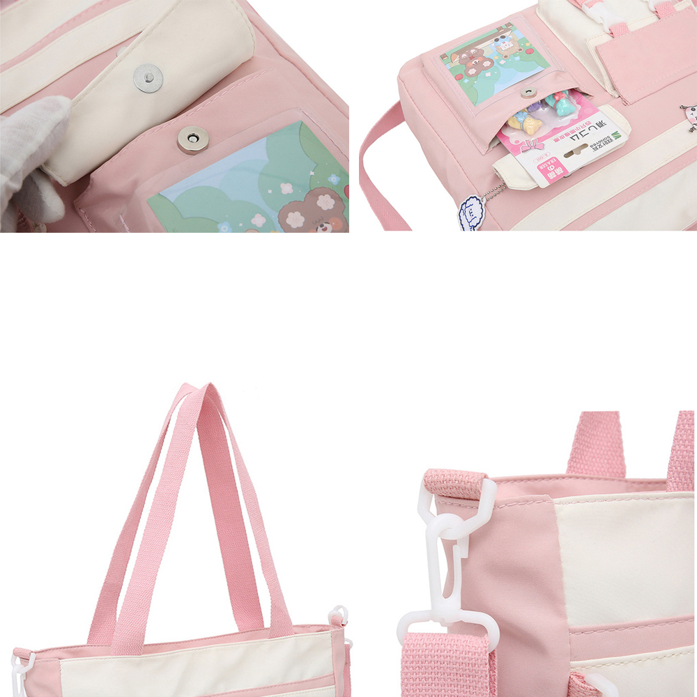 Nahaufnahmen einer rosa Tragetasche mit mehreren Fächern. Mit einer transparenten Tasche.