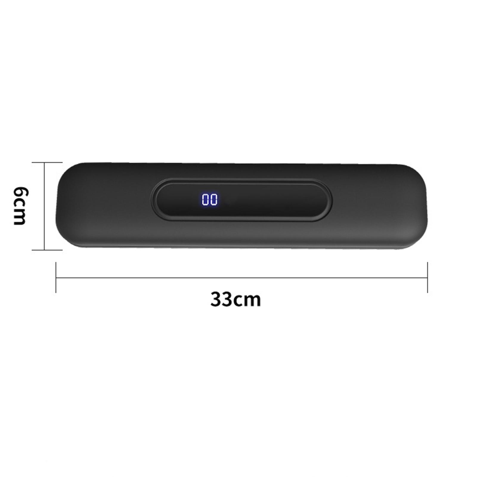 Schwarzes Gerät mit den Maßen: 33 cm lang und 6 cm hoch. Display zeigt '00'.