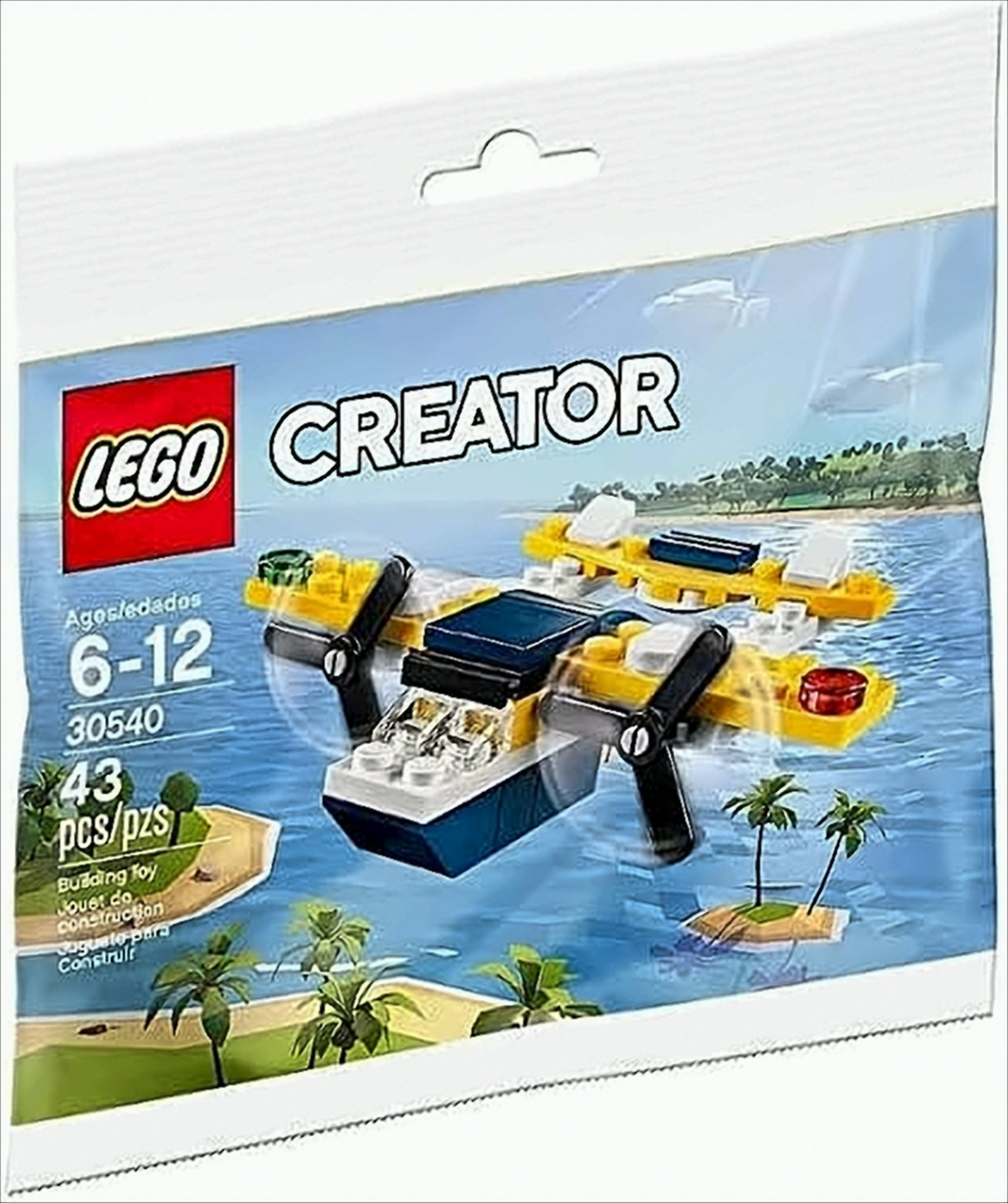 Ein LEGO Creator Flugzeug in einer Plastiktüte, mit Wasser- und Inselhintergrund. Es ist für 6-12 Jahre geeignet.