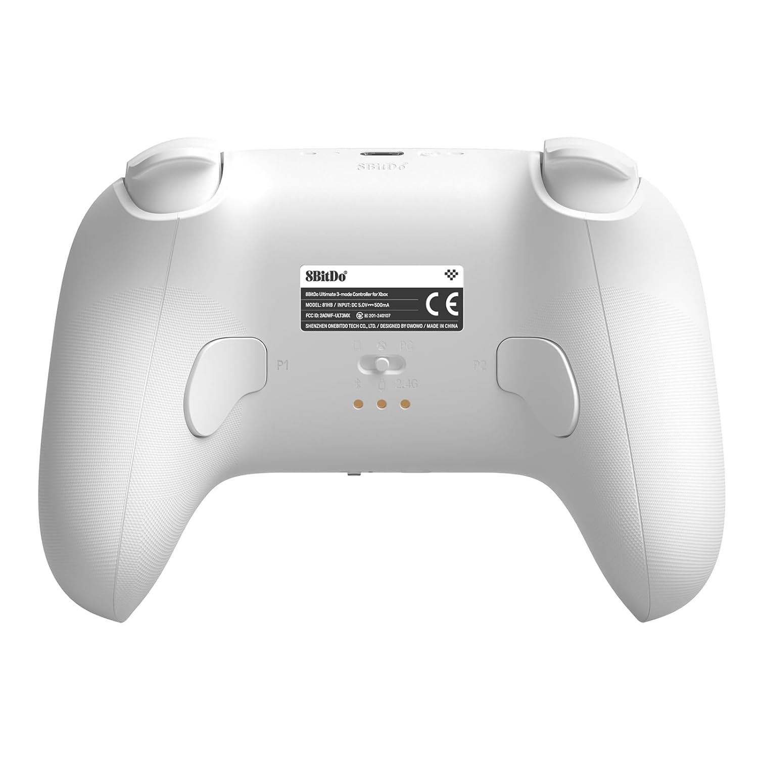 Rückseite des weißen Gamecontrollers mit Knöpfen und einem Etikett.