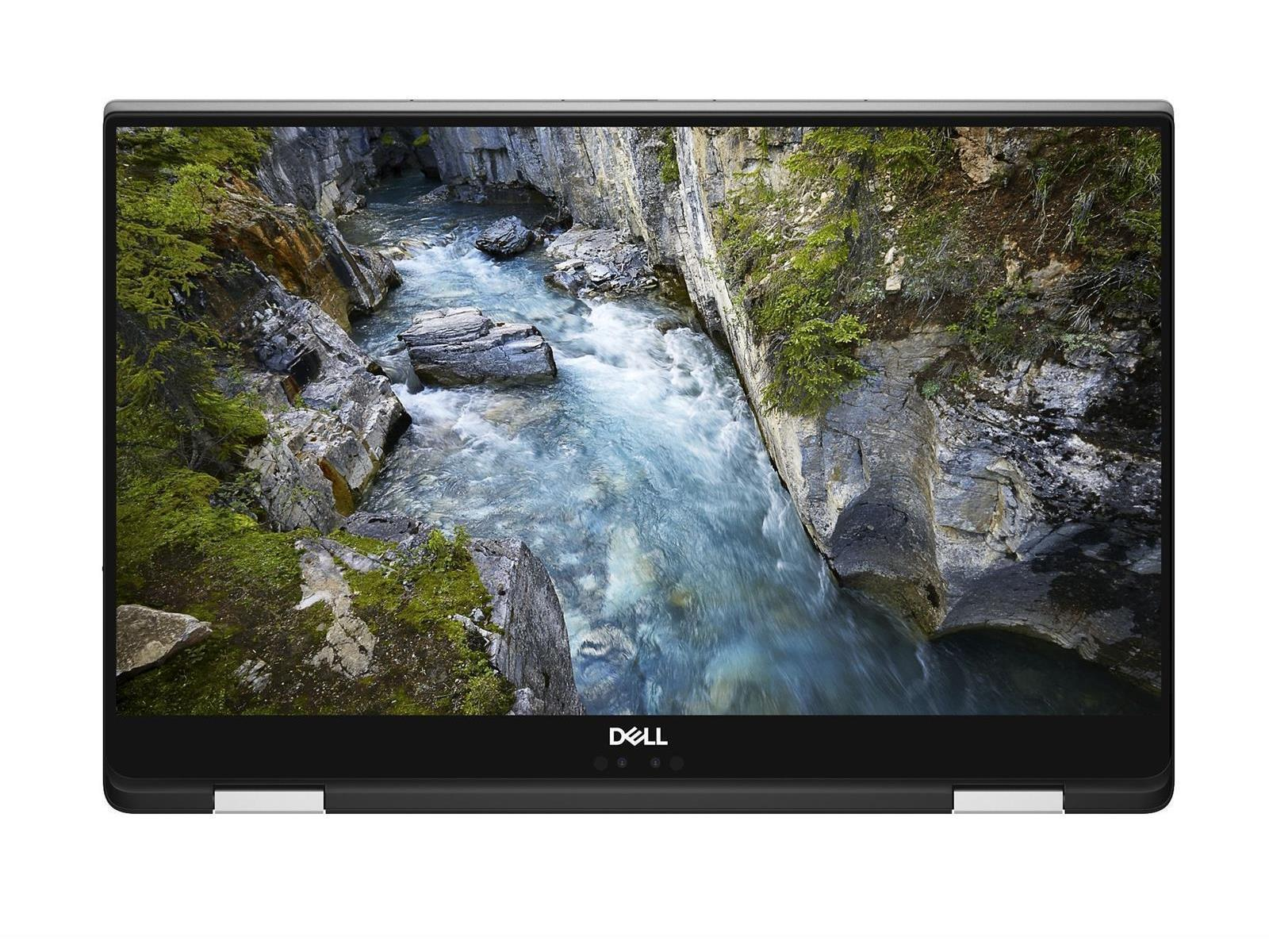 Dell Laptop, Bildschirm zeigt Fluss in Schlucht. Schwarzer Bildschirm, geöffnet, auf weißer Fläche.