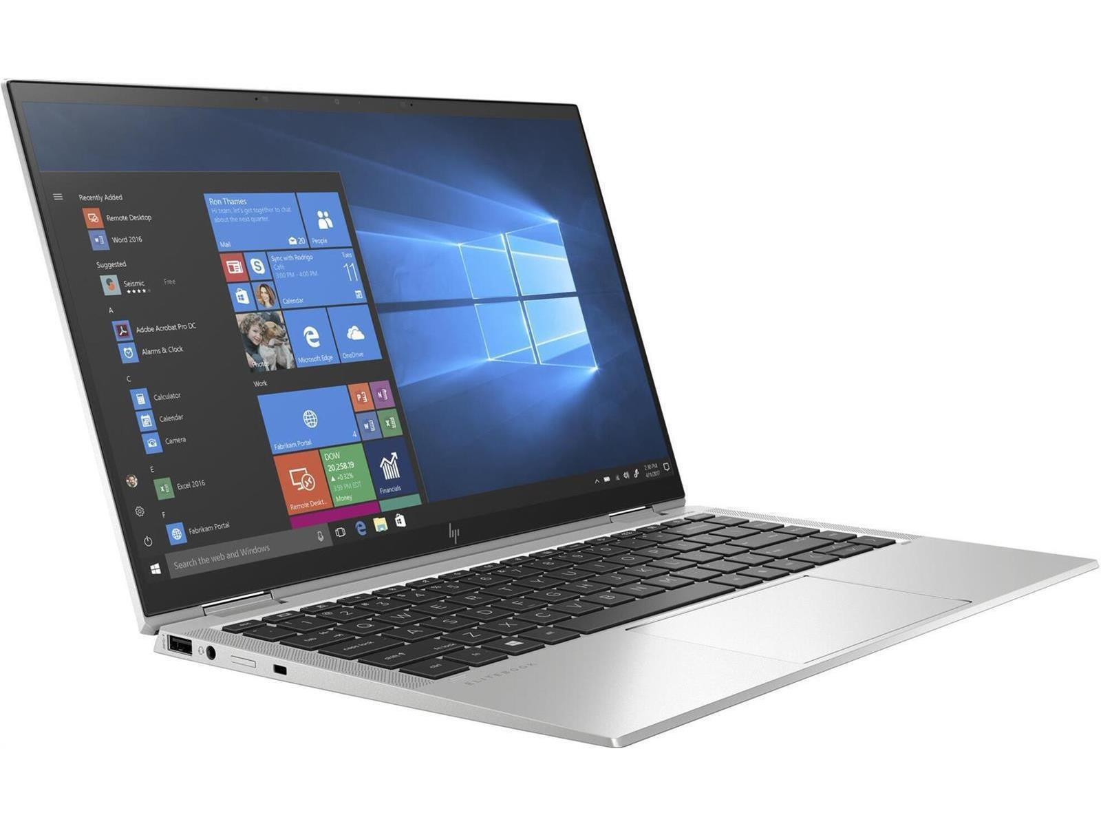 Ein silberner Laptop, der geöffnet ist und Windows zeigt. Der Bildschirm zeigt ein blaues Fensterdesign.